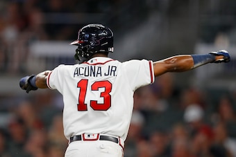 ATLANTA, GA - AUGUST 13:  Ronald Acuna Jr. #13 of the Atlanta Braves reacts on the way to homeplate as he scores on a RBI single by Freddie Freeman #5 in the fifth inning against the Miami Marlins during game two of a doubleheader at SunTrust Park on Augu