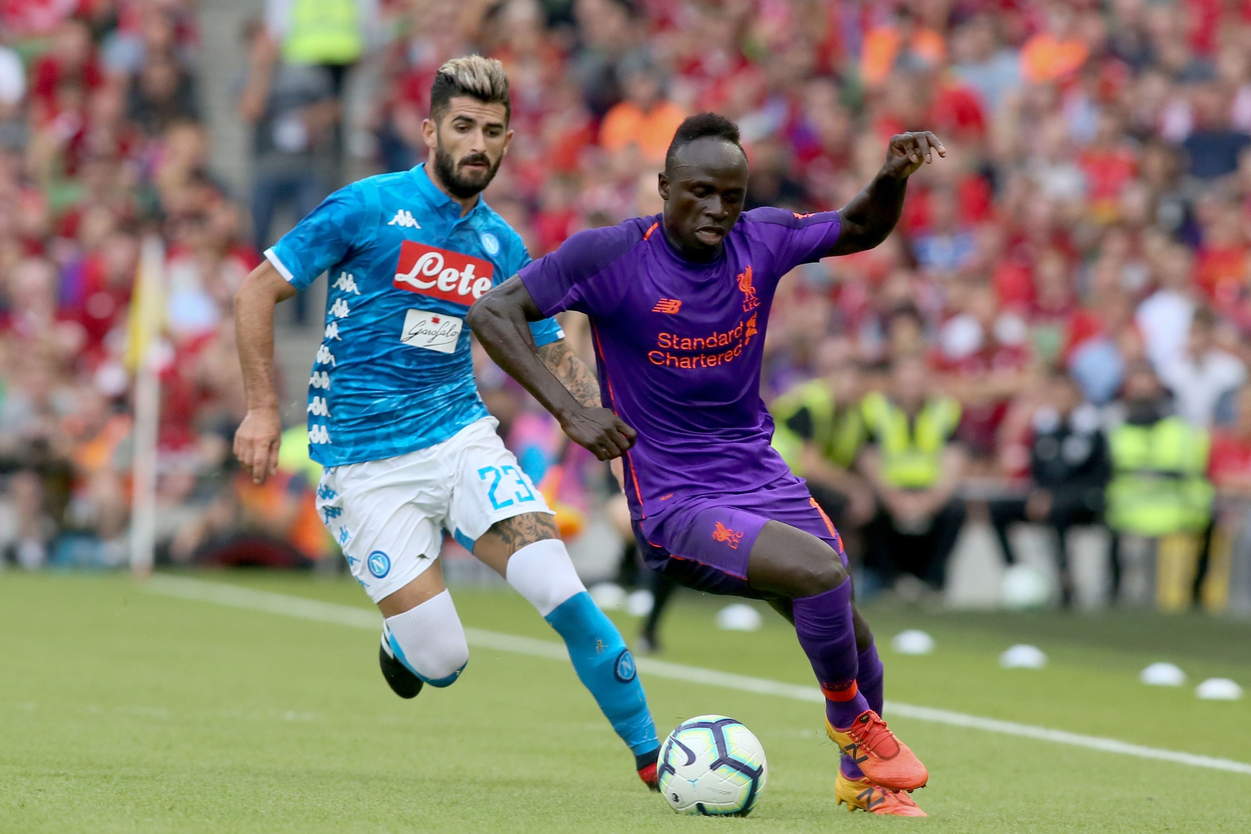 Liverpool's Senegalese midfielder Sadio Mane (R) takes on Napoli's Albanian defender Elseid Hysaj (L) during the pre-season friendly football match between Liverpool and Napoli at the Aviva Stadimum in Dublin on August 4, 2018. (Photo by Paul FAITH / AFP) Liverpool's Senegalese midfielder Sadio Mane (R) takes on Napoli's Albanian defender Elseid Hysaj (L) during the pre-season friendly football match between Liverpool and Napoli at the Aviva Stadimum in Dublin on August 4, 2018. (Photo by Paul FAITH / AFP)