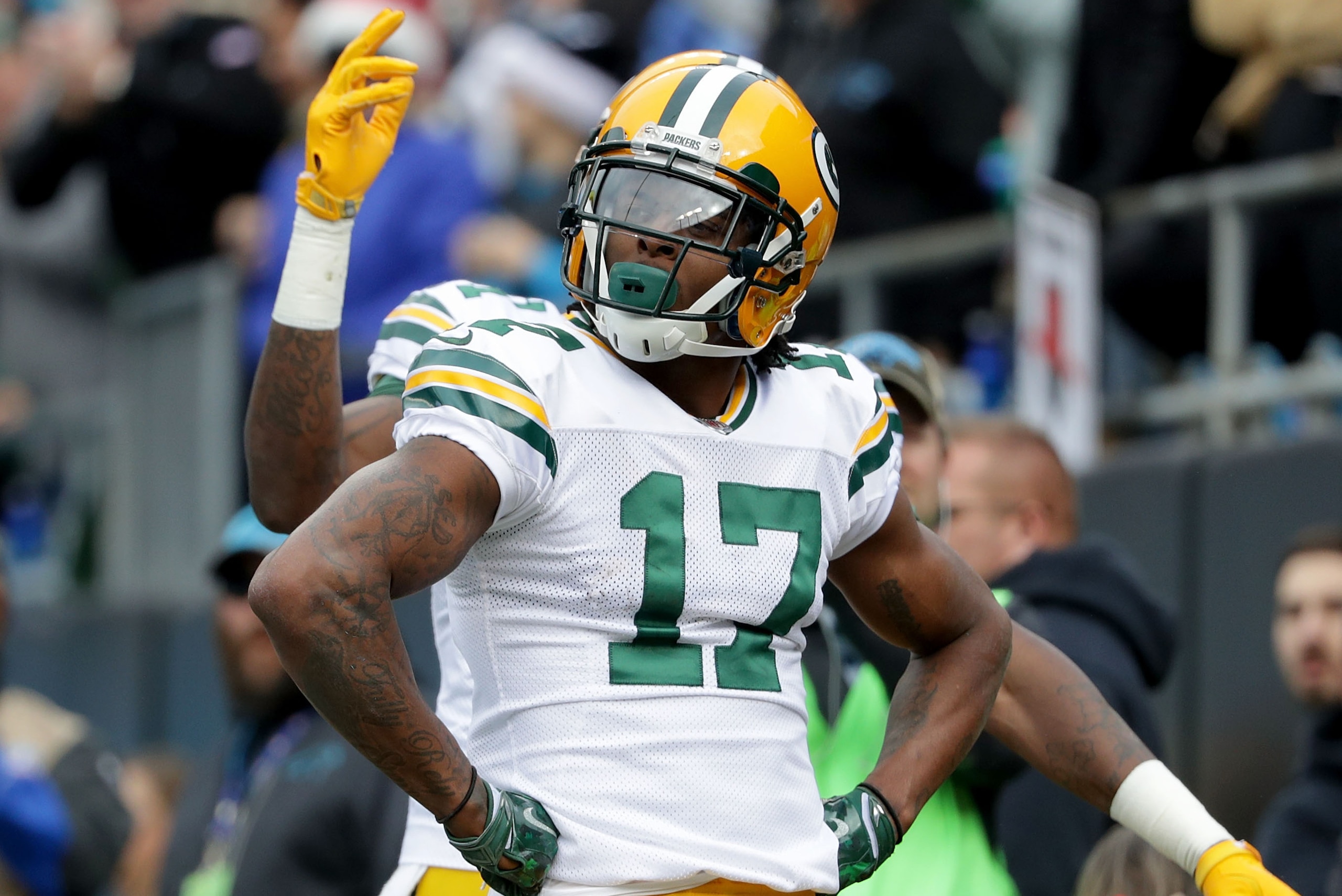 CHARLOTTE, NC - DECEMBER 17:  Davante Adams #17 of the Green Bay Packers reacts after scoring a touchdown against the Carolina Panthers in the first quarter during their game at Bank of America Stadium on December 17, 2017 in Charlotte, North Carolina.  (