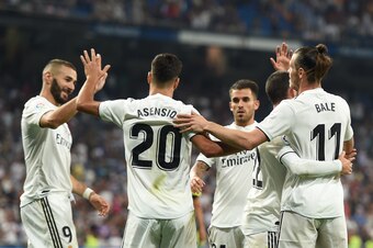 MADRID, SPAIN - AUGUST 19: Gareth Bale of Real Madrid celebrates with Marco Asensio after scoring his teams second goal during the La Liga match between Real Madrid CF and Getafe CF at Estadio Santiago Bernabeu on August 19, 2018 in Madrid, Spain. (Photo 