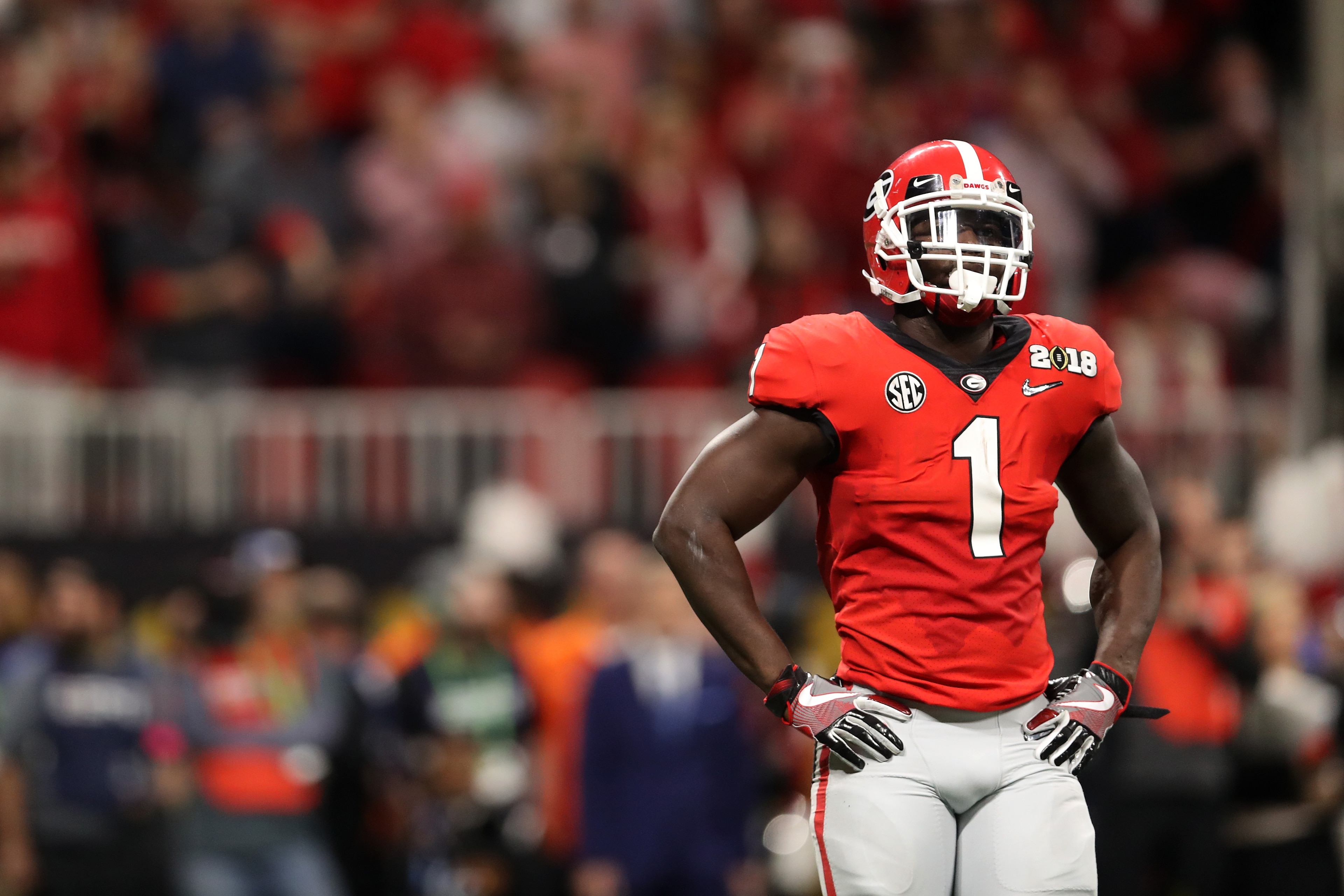 ATLANTA, GA - JANUARY 08: Sony Michel #1 of the Georgia Bulldogs stands on the field during the second quarter against the Alabama Crimson Tide in the CFP National Championship presented by AT&T at Mercedes-Benz Stadium on January 8, 2018 in Atlanta, Geor ATLANTA, GA - JANUARY 08: Sony Michel #1 of the Georgia Bulldogs stands on the field during the second quarter against the Alabama Crimson Tide in the CFP National Championship presented by AT&T at Mercedes-Benz Stadium on January 8, 2018 in Atlanta, Geor