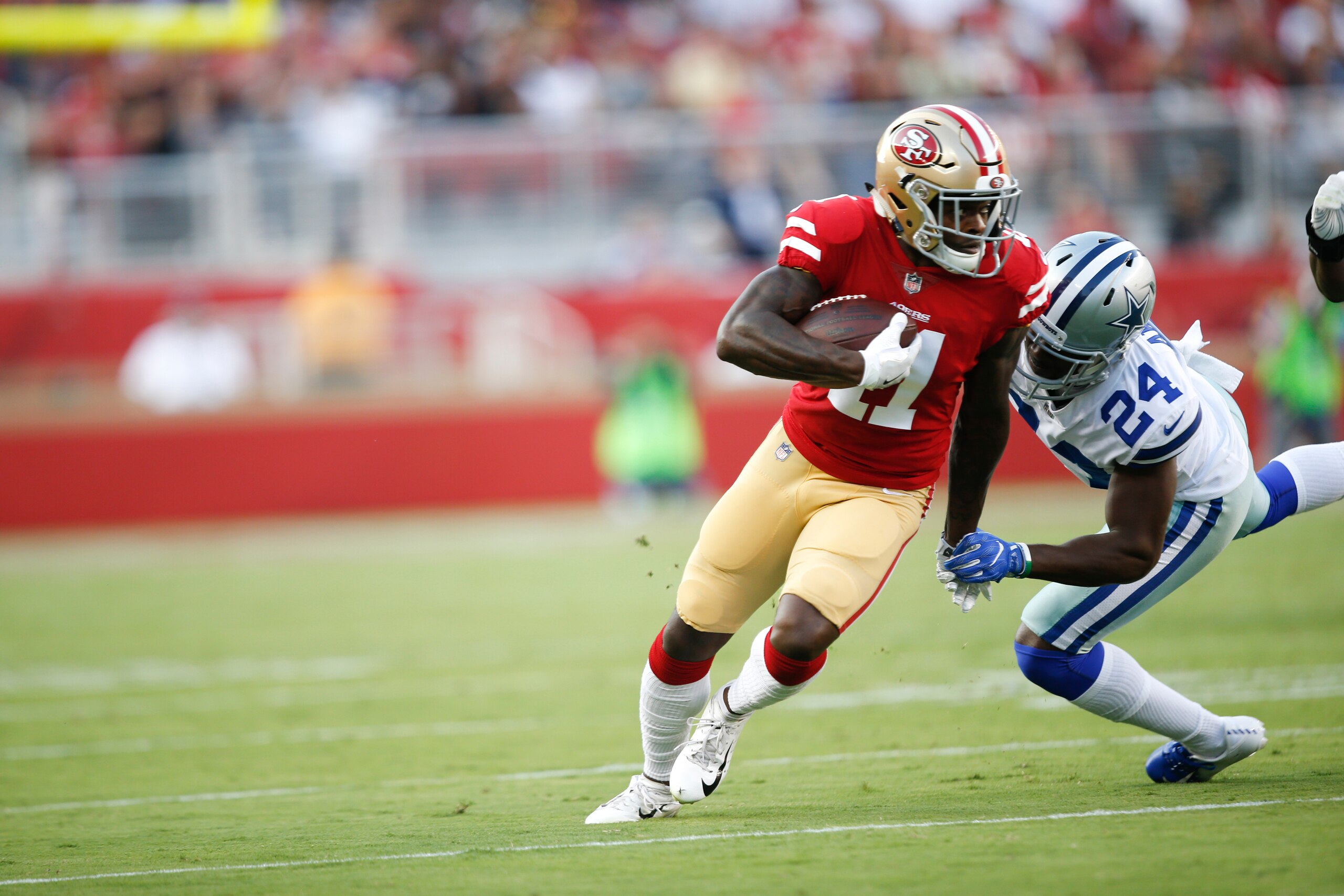 SANTA CLARA, CA - AUGUST 9: Marquise Goodwin #11 of the San Francisco 49ers runs after making a reception during the game against the Dallas Cowboys at Levi Stadium on August 9, 2018 in Santa Clara, California. The 49ers defeated the Cowboys 24-21. (Photo