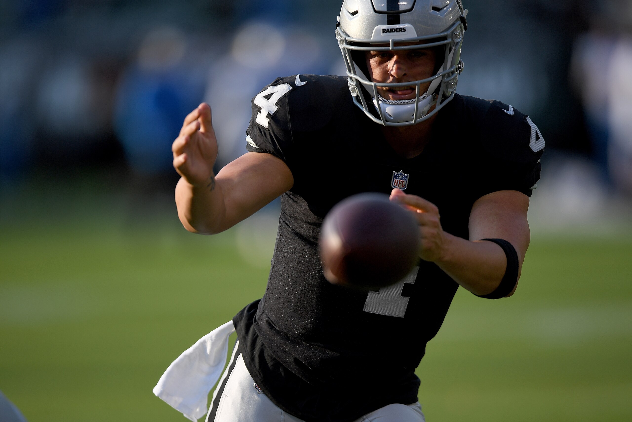 OAKLAND, CA - AUGUST 10:  Derek Carr #4 of the Oakland Raiders warms up during pregame warm ups prior to the start of a preseason NFL football game against the Detroit Lions at Oakland Alameda Coliseum on August 10, 2018 in Oakland, California.  (Photo by