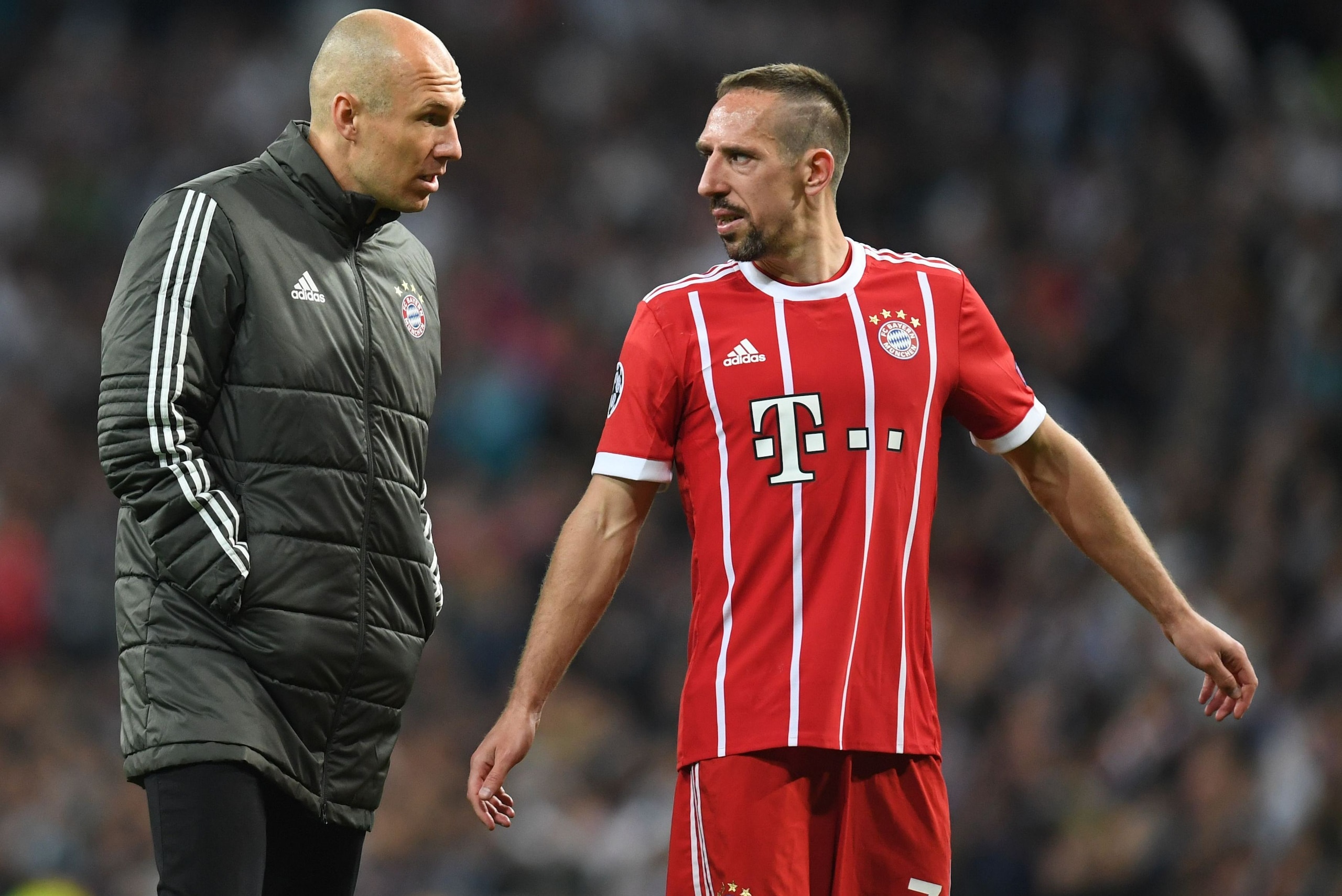 Bayern Munich's Dutch midfielder Arjen Robben (L) and Bayern Munich's French midfielder Franck Ribery react after the UEFA Champions League semi-final second-leg football match Real Madrid CF vs FC Bayern Munich in Madrid, Spain, on May 1, 2018. (Photo by Bayern Munich's Dutch midfielder Arjen Robben (L) and Bayern Munich's French midfielder Franck Ribery react after the UEFA Champions League semi-final second-leg football match Real Madrid CF vs FC Bayern Munich in Madrid, Spain, on May 1, 2018. (Photo by
