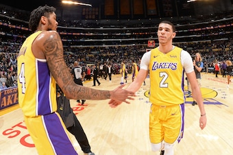LOS ANGELES, CA - JANUARY 9: Brandon Ingram #14 and Lonzo Ball #2 of the Los Angeles Lakers exchange high fives during the game against the Sacramento Kings on January 9, 2018 at STAPLES Center in Los Angeles, California. NOTE TO USER: User expressly ackn