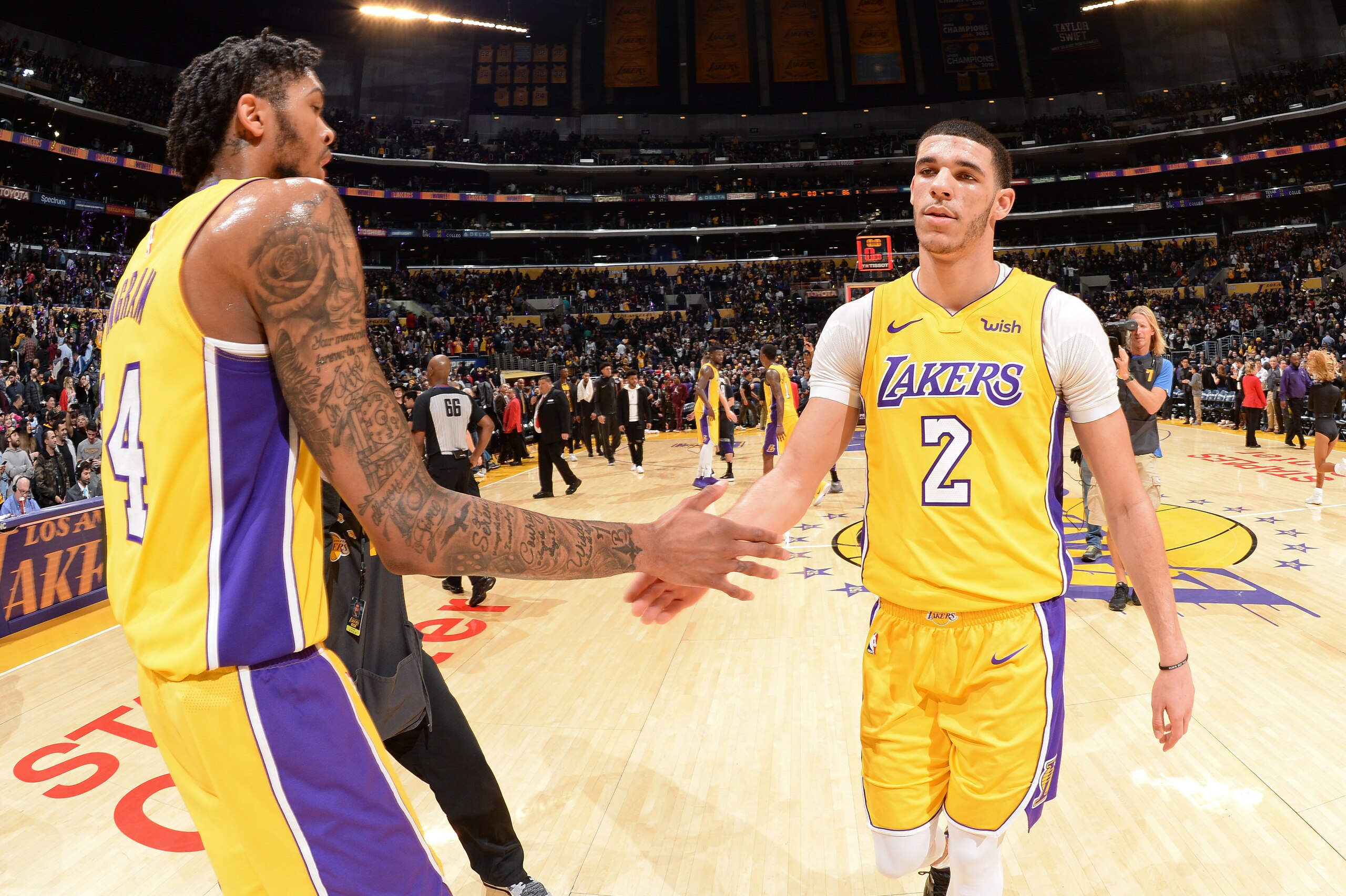 LOS ANGELES, CA - JANUARY 9: Brandon Ingram #14 and Lonzo Ball #2 of the Los Angeles Lakers exchange high fives during the game against the Sacramento Kings on January 9, 2018 at STAPLES Center in Los Angeles, California. NOTE TO USER: User expressly ackn