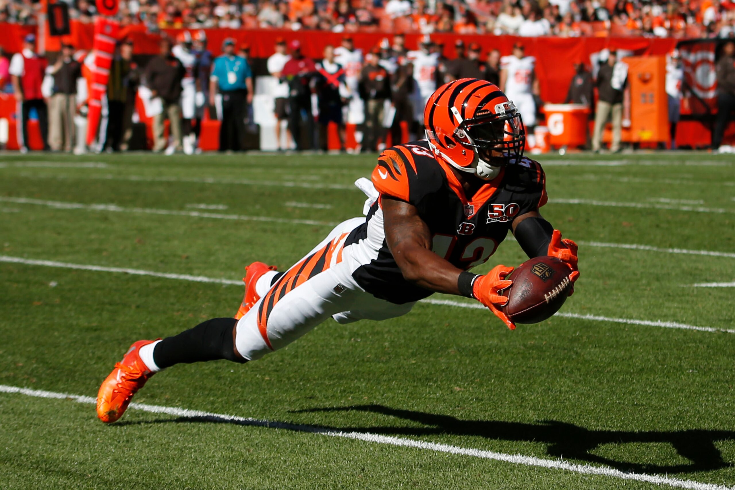 CLEVELAND, OH - OCTOBER 01: George Iloka #43 of the Cincinnati Bengals makes a diving catch in the second half against the Cleveland Browns at FirstEnergy Stadium on October 1, 2017 in Cleveland, Ohio. (Photo by Justin Aller /Getty Images)