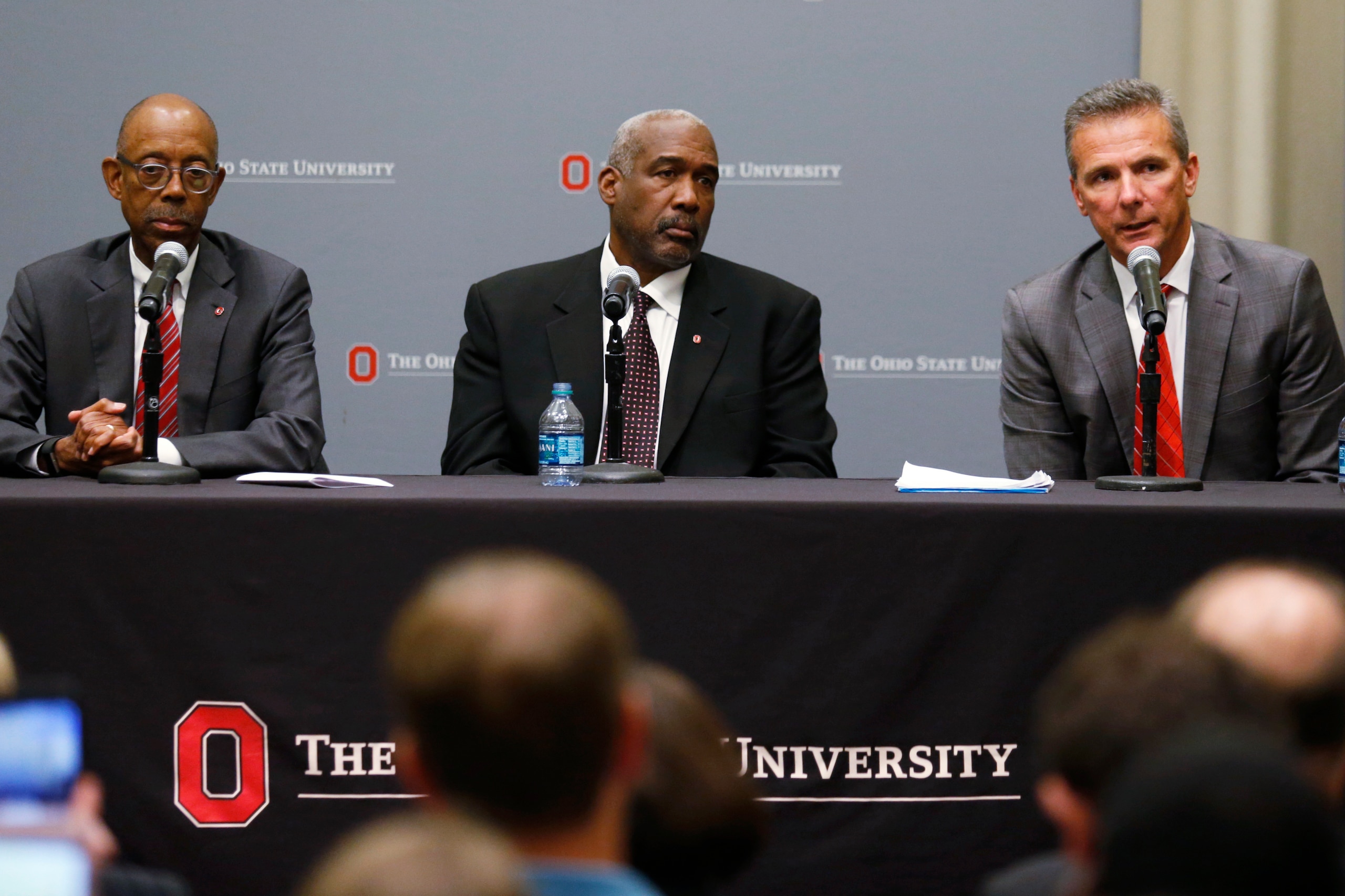 Meyer (right) along with OSU President Michael Drake (left) and athletic director Gene Smith Meyer (right) along with OSU President Michael Drake (left) and athletic director Gene Smith