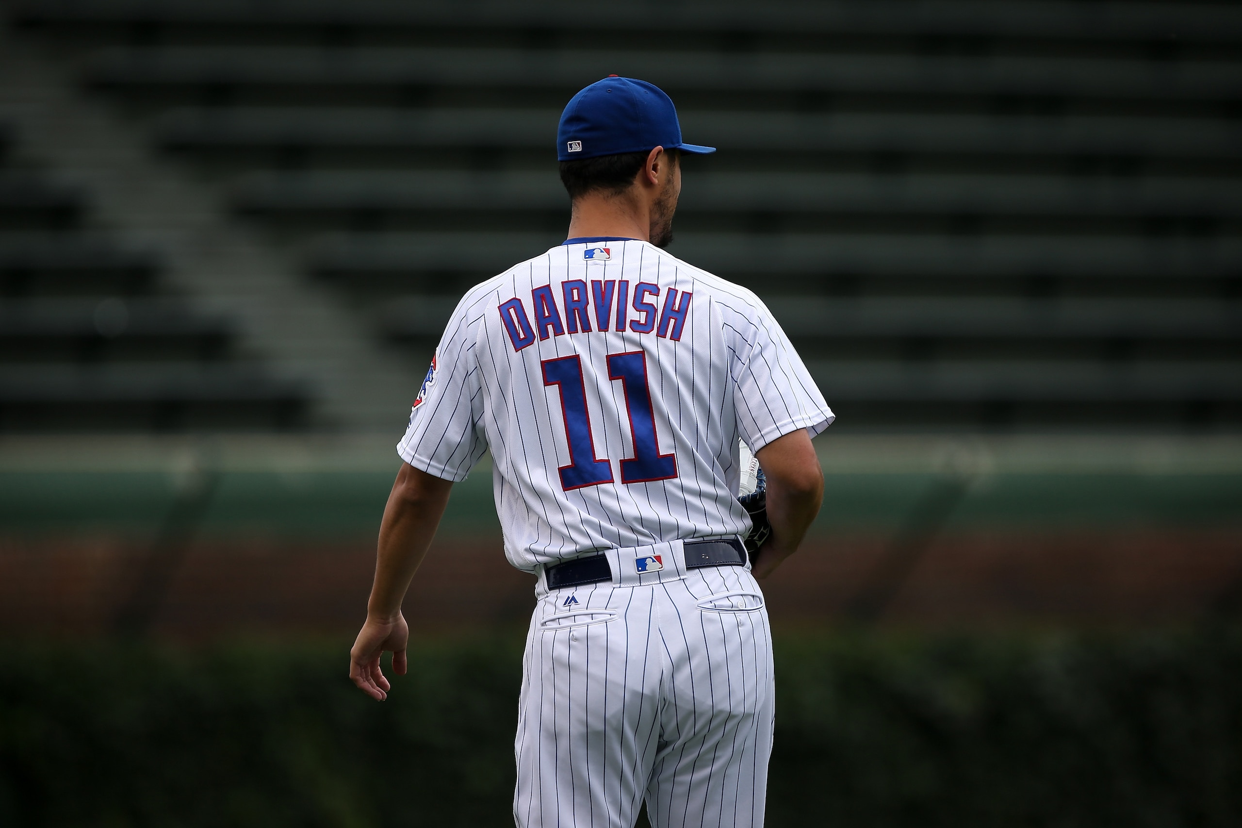 CHICAGO, IL - JUNE 20: Yu Darvish #11 of the Chicago Cubs walks across the field before throwing a simulated game before the game against the Los Angeles Dodgers at Wrigley Field on June 20, 2018 in Chicago, Illinois. (Photo by Dylan Buell/Getty Images) CHICAGO, IL - JUNE 20: Yu Darvish #11 of the Chicago Cubs walks across the field before throwing a simulated game before the game against the Los Angeles Dodgers at Wrigley Field on June 20, 2018 in Chicago, Illinois. (Photo by Dylan Buell/Getty Images)
