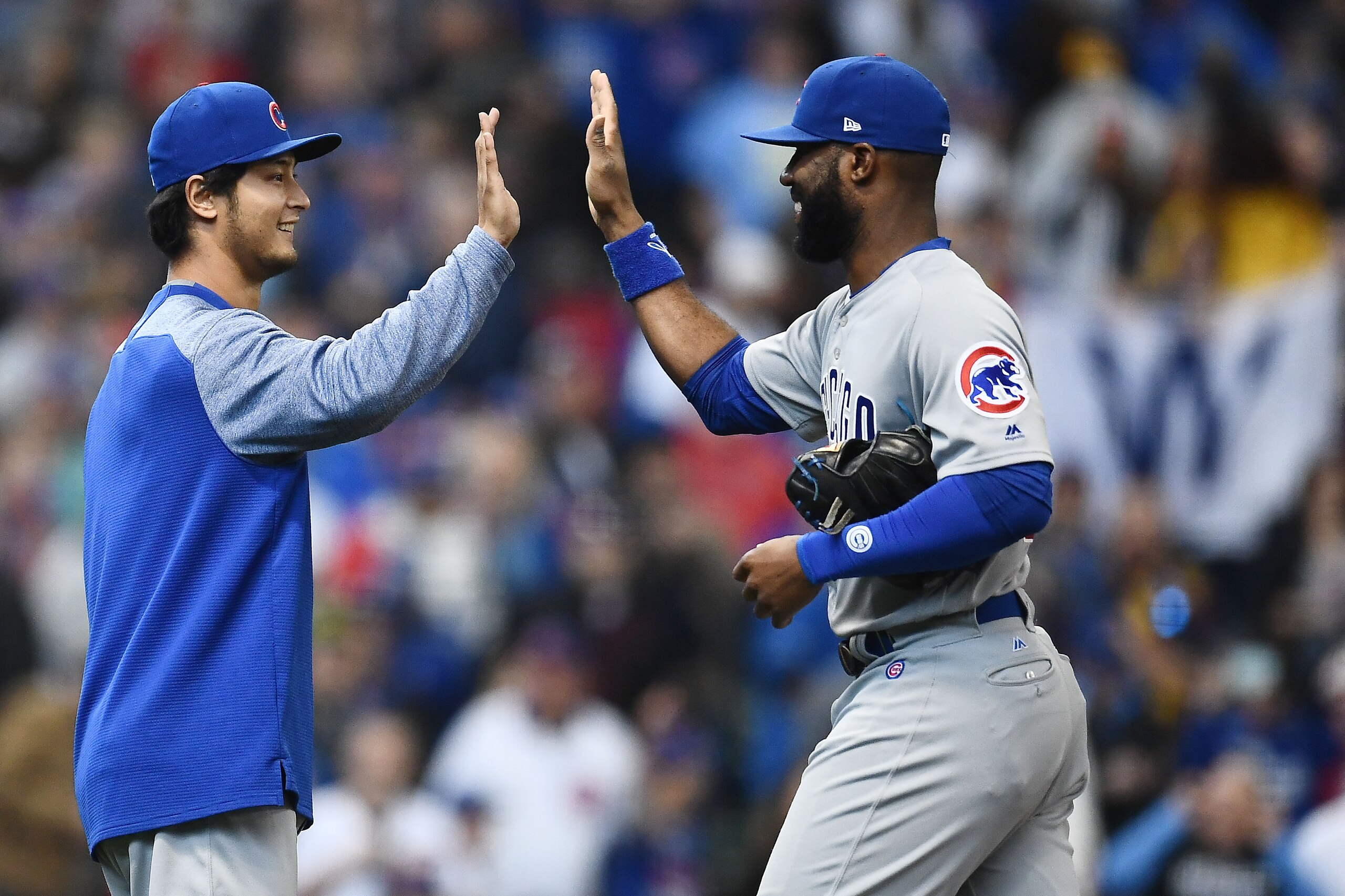 MILWAUKEE, WI - APRIL 08: Yu Darvish #11 of the Chicago Cubs celebrates a victory over the Milwaukee Brewers with Jason Heyward #22 at Miller Park on April 8, 2018 in Milwaukee, Wisconsin. (Photo by Stacy Revere/Getty Images) MILWAUKEE, WI - APRIL 08: Yu Darvish #11 of the Chicago Cubs celebrates a victory over the Milwaukee Brewers with Jason Heyward #22 at Miller Park on April 8, 2018 in Milwaukee, Wisconsin. (Photo by Stacy Revere/Getty Images)