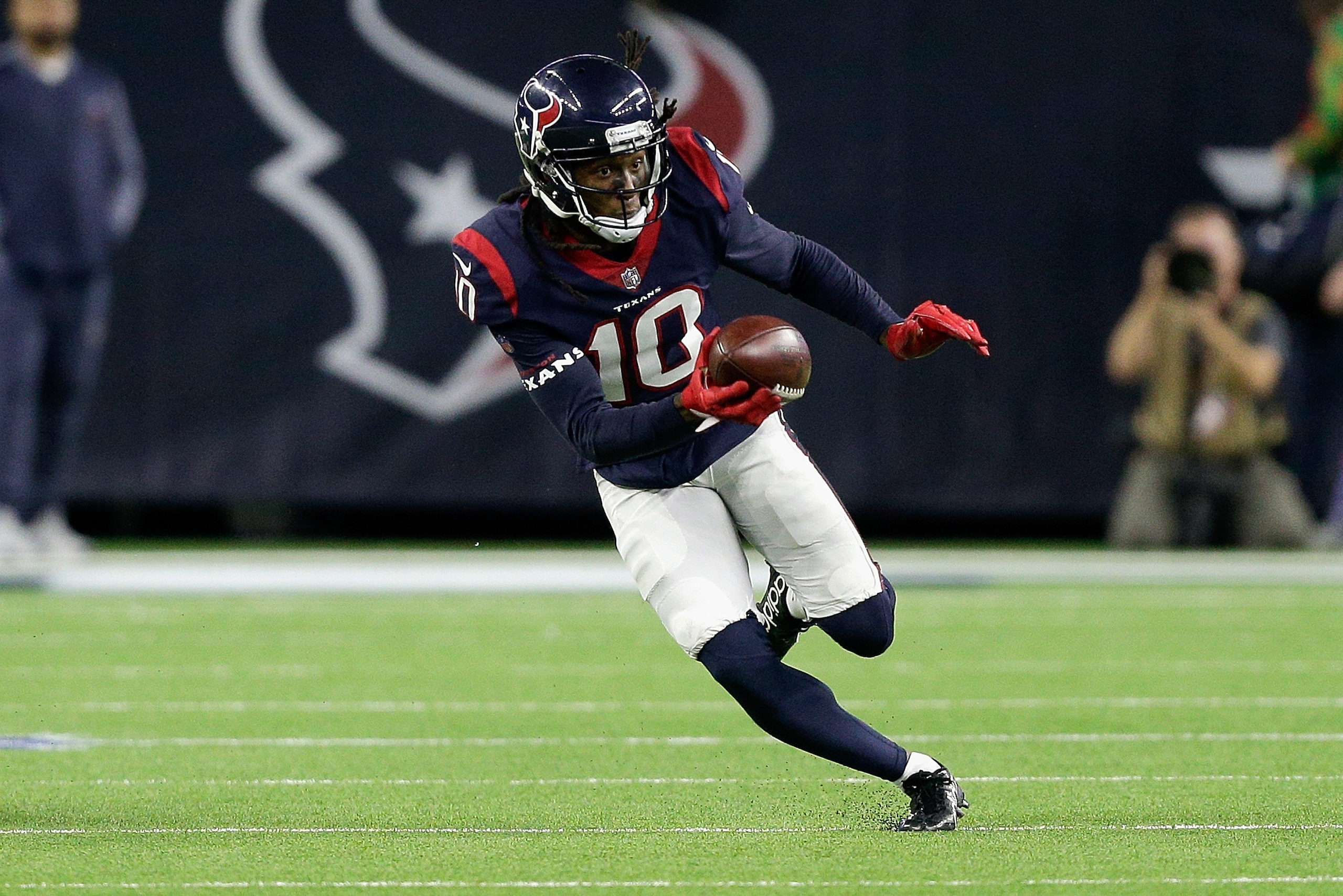 HOUSTON, TX - DECEMBER 25: DeAndre Hopkins #10 of the Houston Texans runs with the ball after a catch against the Pittsburgh Steelers during game action at NRG Stadium on December 25, 2017 in Houston, Texas. The Pittsburgh Steelers defeated the Houston Te