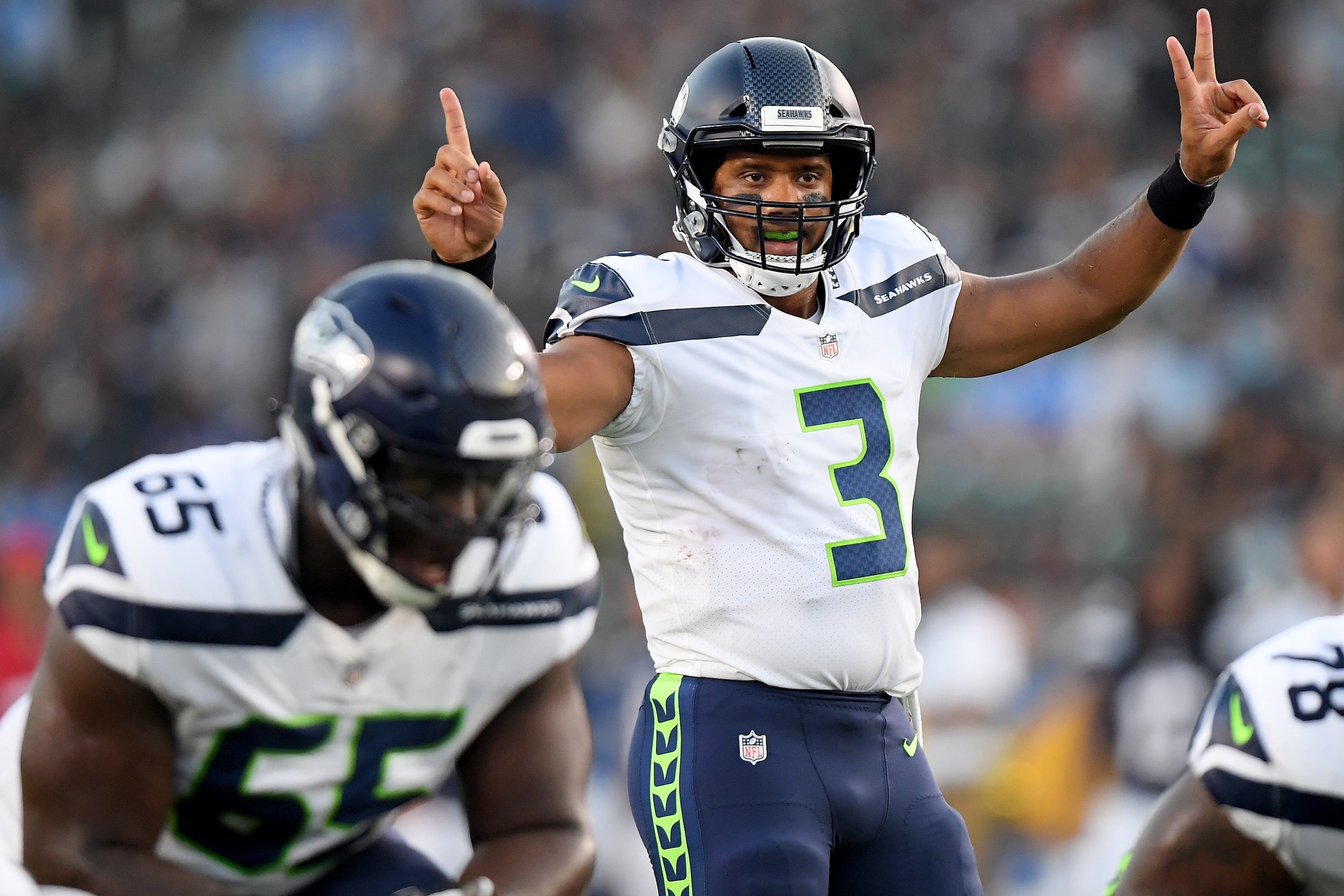 CARSON, CA - AUGUST 18:  Russell Wilson #3 of the Seattle Seahawkscalls a play at the line during the first quarter of a presseason game against the Los Angeles Chargers at StubHub Center on August 18, 2018 in Carson, California.  (Photo by Harry How/Gett