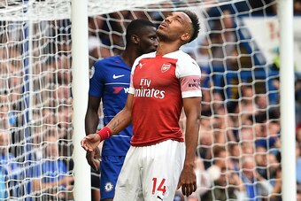 Arsenal's Gabonese striker Pierre-Emerick Aubameyang reacts after missing a chance during the English Premier League football match between Chelsea and Arsenal at Stamford Bridge in London on August 18, 2018. (Photo by Glyn KIRK / AFP) / RESTRICTED TO EDI
