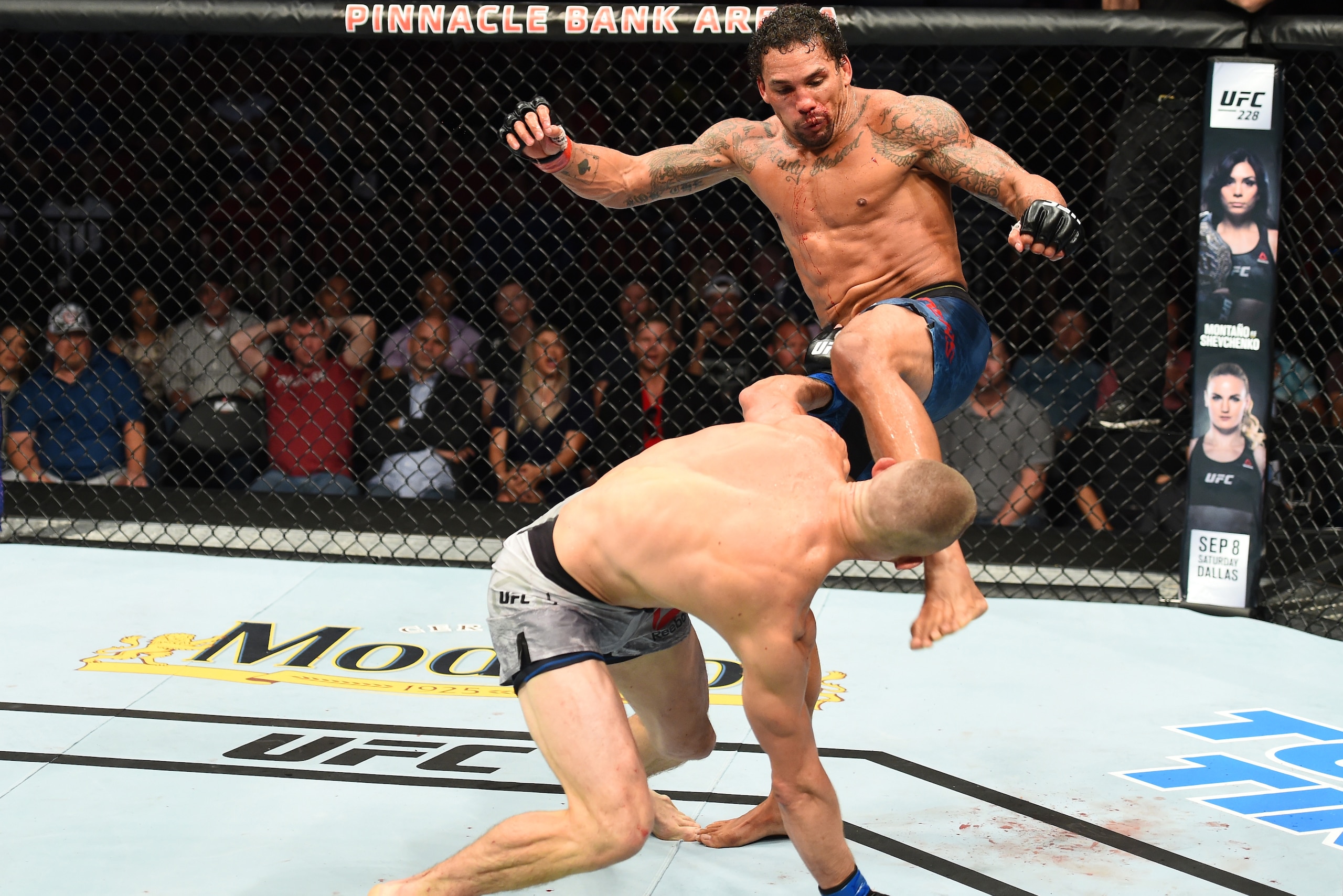 LINCOLN, NE - AUGUST 25:  (R-L) Eryk Anders knocks out Tim Williams with a kick in their middleweight fight during the UFC Fight Night event at Pinnacle Bank Arena on August 25, 2018 in Lincoln, Nebraska. (Photo by Josh Hedges/Zuffa LLC/Zuffa LLC via Gett