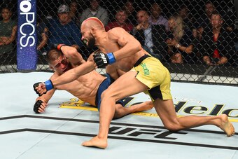 LINCOLN, NE - AUGUST 25:  (R-L) Deiveson Figueiredo of Brazil punches John Moraga in their flyweight fight during the UFC Fight Night event at Pinnacle Bank Arena on August 25, 2018 in Lincoln, Nebraska. (Photo by Josh Hedges/Zuffa LLC/Zuffa LLC via Getty