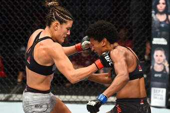 LINCOLN, NE - AUGUST 25:  (L-R) Cortney Casey punches Angela Hill in their womens strawweight fight during the UFC Fight Night event at Pinnacle Bank Arena on August 25, 2018 in Lincoln, Nebraska. (Photo by Josh Hedges/Zuffa LLC/Zuffa LLC via Getty Images
