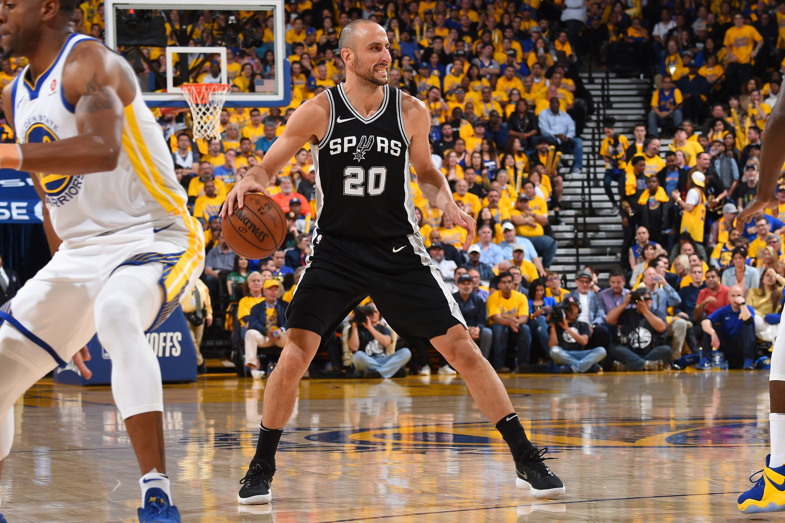 OAKLAND, CA - APRIL 24:  Manu Ginobili #20 of the San Antonio Spurs handles the ball against the Golden State Warriors in Game Five of Round One of the 2018 NBA Playoffs on April 24, 2018 at ORACLE Arena in Oakland, California. NOTE TO USER: User expressl