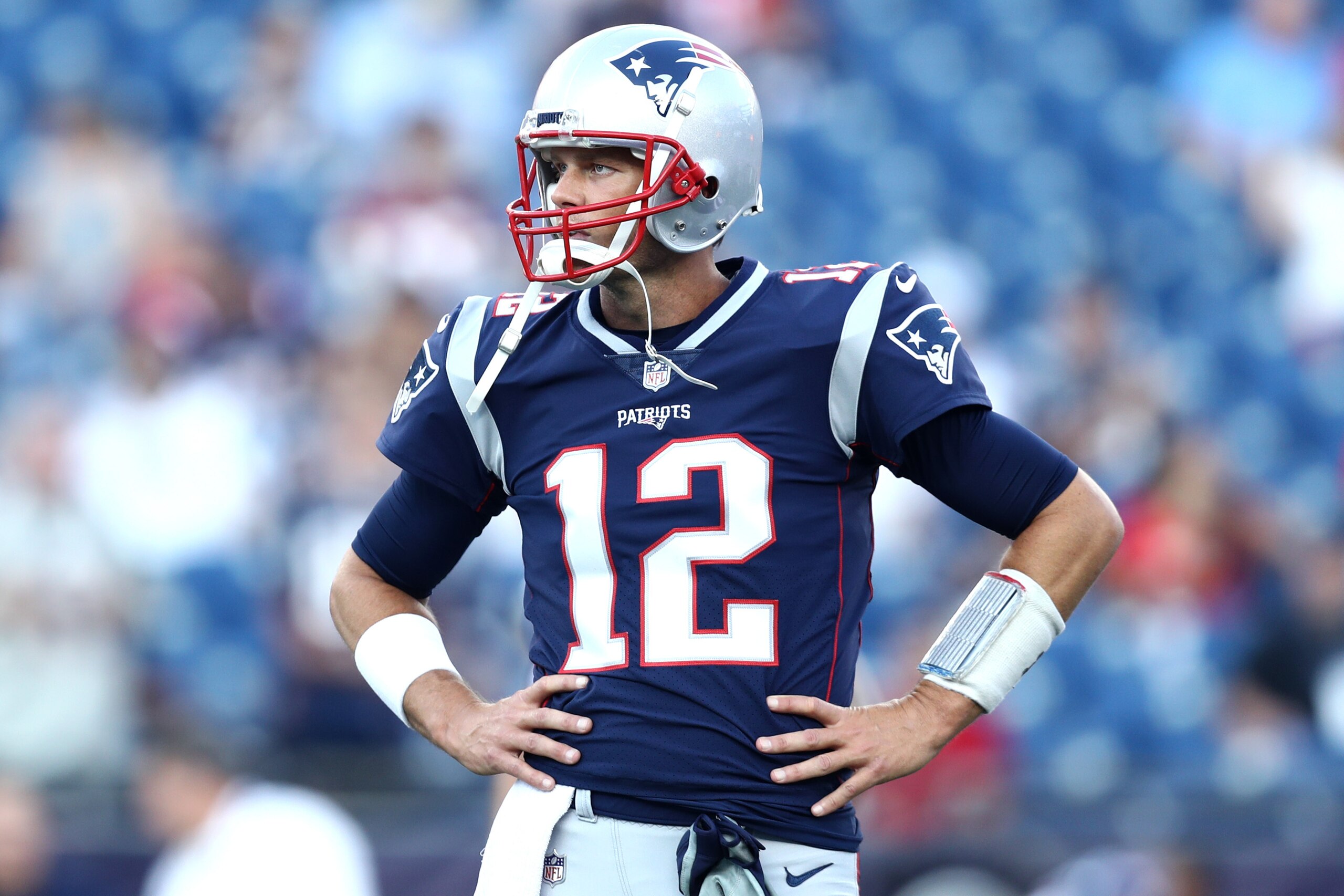 FOXBOROUGH, MA - AUGUST 9 : Tom Brady #12 of the New England Patriots looks on before the preseason game between the New England Patriots and the Washington Redskins at Gillette Stadium on August 9, 2018 in Foxborough, Massachusetts. (Photo by Maddie Meye