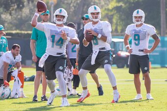 DAVIE, FL - JULY 26:  Bryce Petty #14 Brock Osweiler #8 David Fales #9 perform passing drills during Miami Dolphins Training Camp at Baptist Health Training Facility at Nova Southeastern University on July 26, 2018 in Davie, Florida. (Photo by Mark Brown/