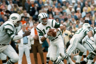 MIAMI, FL - JANUARY 12:  Joe Namath #12 of the New York Jets drops back to pass against the Baltimore Colts during Super Bowl III at the Orange Bowl on January 12, 1969 in Miami, Florida. The Jets defeated the Colts 16-7. (Photo by Focus on Sport/Getty Im