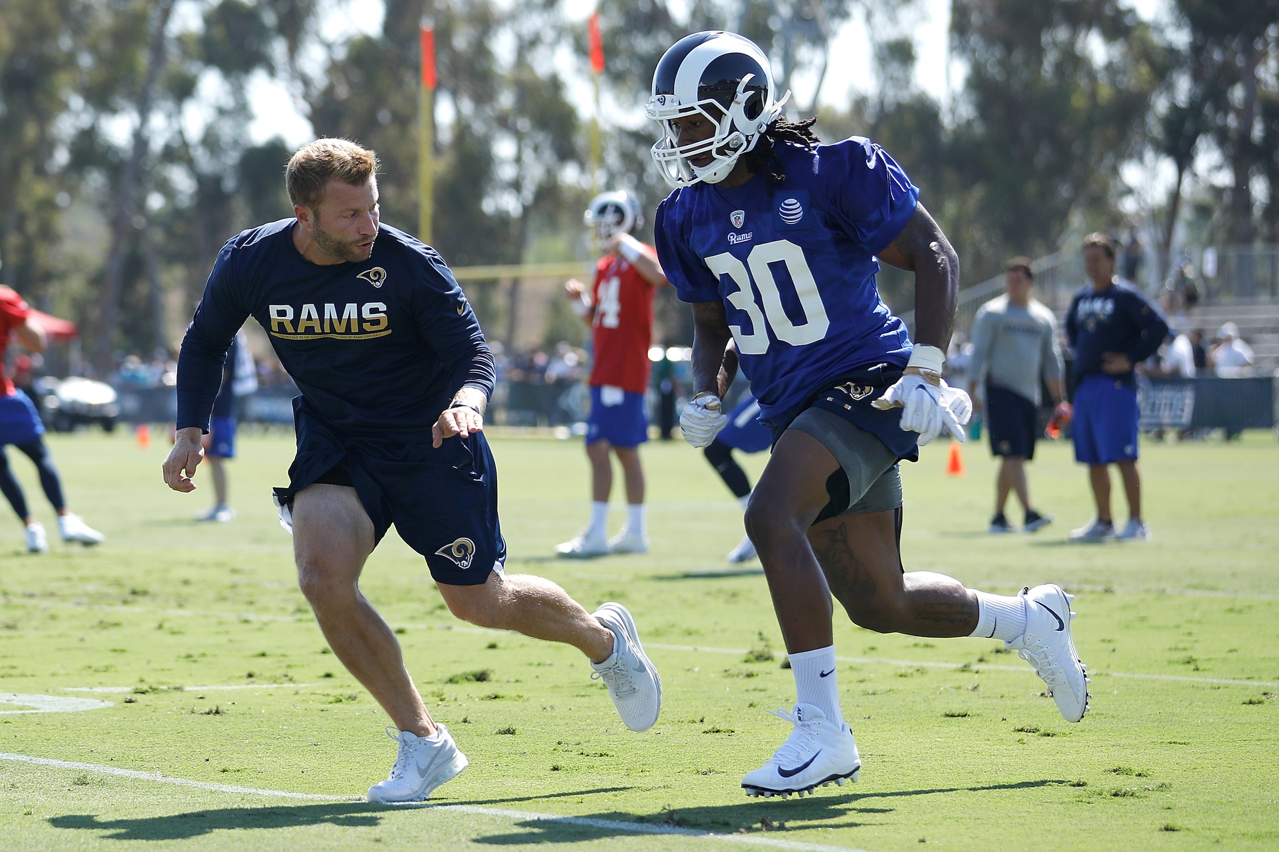 IRVINE, CA - JULY 30: Head Coach Sean McVay of the Los Angeles Rams runs through a drill with Todd Gurley #30 during Training Camp at Crawford Field on July 30, 2017 in Irvine, California. (Photo by Josh Lefkowitz/Getty Images) IRVINE, CA - JULY 30: Head Coach Sean McVay of the Los Angeles Rams runs through a drill with Todd Gurley #30 during Training Camp at Crawford Field on July 30, 2017 in Irvine, California. (Photo by Josh Lefkowitz/Getty Images)