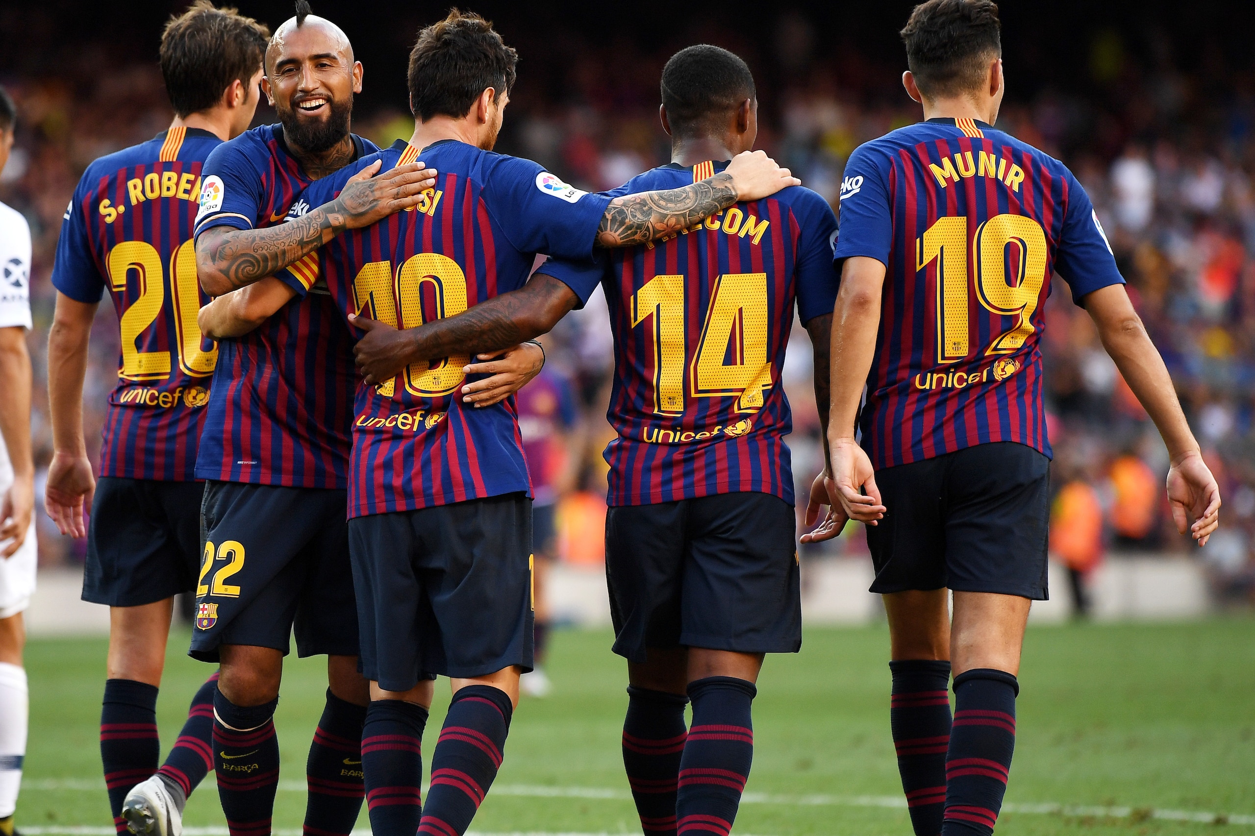 BARCELONA, SPAIN - AUGUST 15:  Lionel Messi of Barcelona (L) celebrates with teammates after scoring his team's second goal during the Joan Gamper Trophy between FC Barcelona and Boca Juniors at Camp Nou on August 15, 2018 in Barcelona, Spain.  (Photo by 