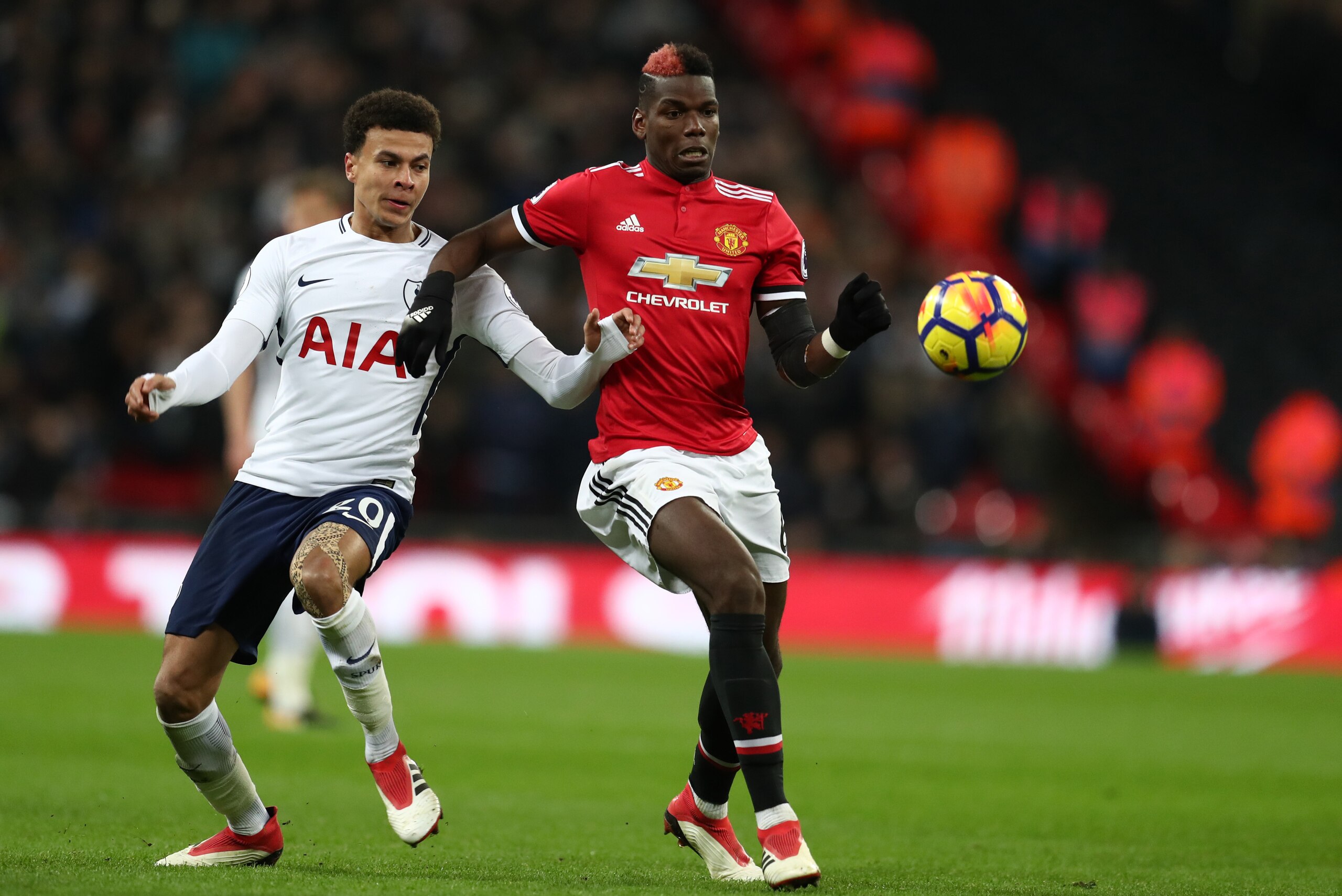 LONDON, ENGLAND - JANUARY 31: Dele Alli of Tottenham Hotspur and Paul Pogba of Manchester United during the Premier League match between Tottenham Hotspur and Manchester United at Wembley Stadium on January 31, 2018 in London, England. (Photo by Catherine