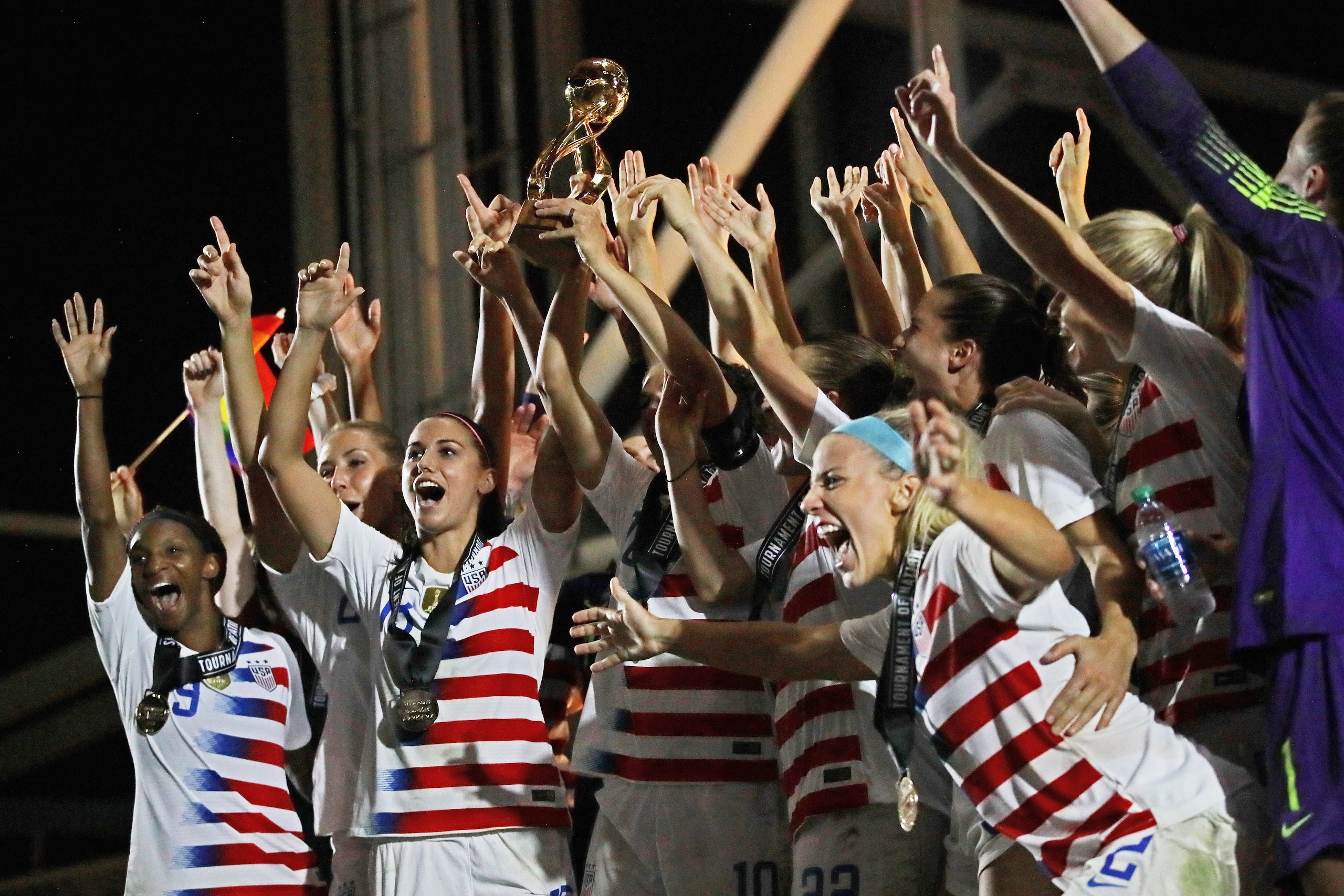 BRIDGEVIEW, IL - AUGUST 02:  Members of the United States celebrate with the trophy after beating Brazil to win the 2018 Tournament Of Nations at Toyota Park on August 2, 2018 in Bridgeview, Illinois. The United States defeated Brazil 4-1.  (Photo by Jona