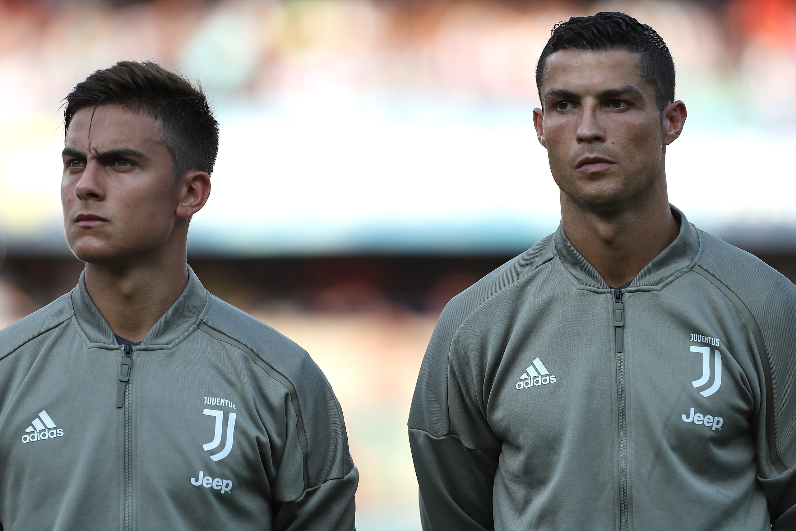 VERONA, ITALY - AUGUST 18:  Paulo Dybala and Cristiano Ronaldo of Juventus FC looks on before the Serie A match between Chievo Verona and Juventus at Stadio Marc'Antonio Bentegodi on August 18, 2018 in Verona, Italy.  (Photo by Marco Luzzani/Getty Images)