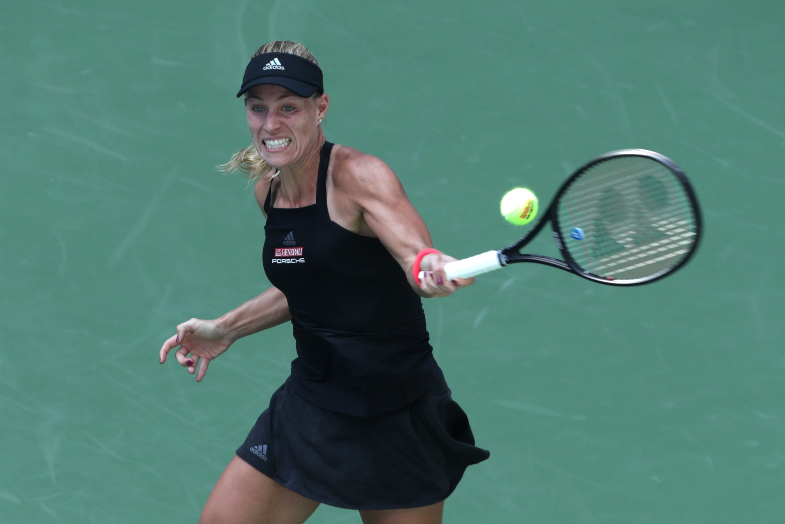 Angelique Kerber of Germany hits a return to Margarita Gasparyan of Russia during their 2018 US Open women's match August 28, 2018 in New York. (Photo by Kena Betancur / AFP)        (Photo credit should read KENA BETANCUR/AFP/Getty Images)