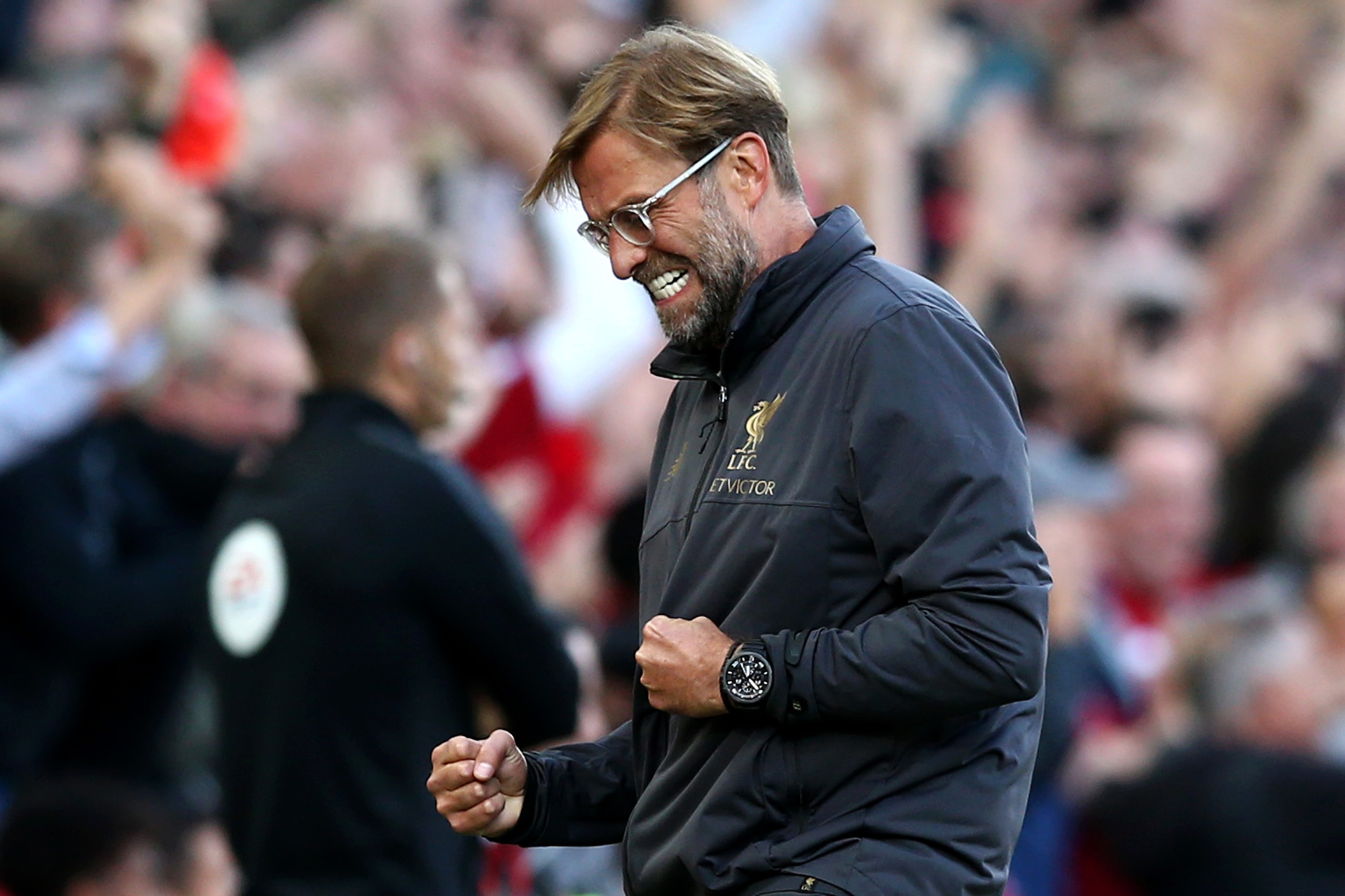 LIVERPOOL, ENGLAND - AUGUST 25:  Jurgen Klopp, Manager of Liverpool celebrates after Mohamed Salah of Liverpool scores his team's first goal during the Premier League match between Liverpool FC and Brighton & Hove Albion at Anfield on August 25, 2018 in L