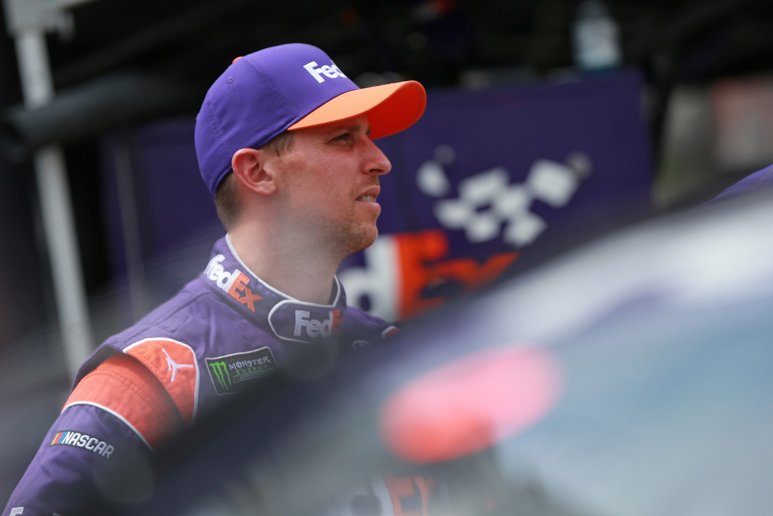 BRISTOL, TN - AUGUST 17:  Denny Hamlin, driver of the #11 FedEx Freight Toyota, stands by his car during practice for the Monster Energy NASCAR Cup Series Bass Pro Shops NRA Night Race at Bristol Motor Speedway on August 17, 2018 in Bristol, Tennessee.  (