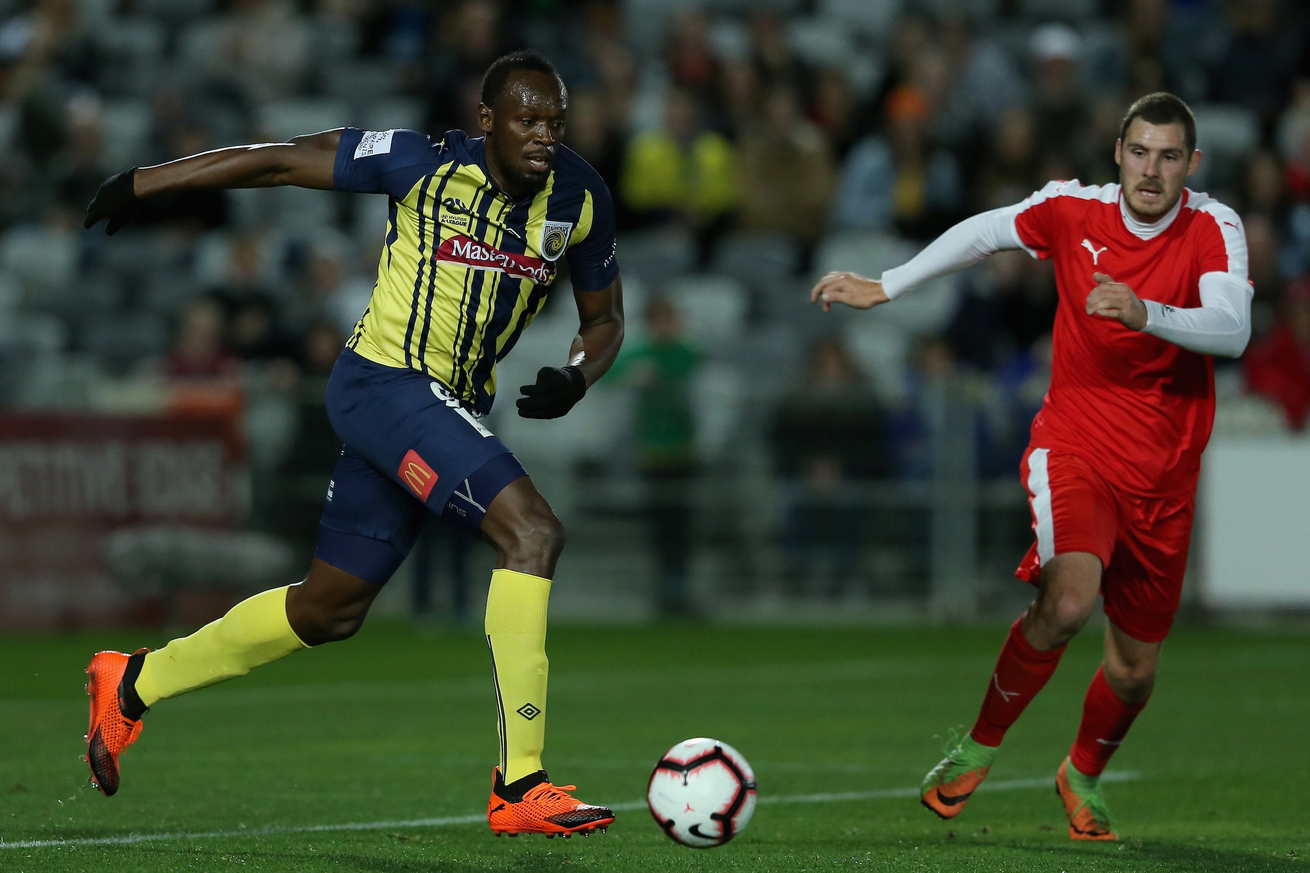 GOSFORD, AUSTRALIA - AUGUST 31: Usain Bolt controls the ball during the pre-season match between the Central Coast Mariners and Central Coast Football at Central Coast Stadium on August 31, 2018 in Gosford, Australia. (Photo by Ashley Feder/Getty Images GOSFORD, AUSTRALIA - AUGUST 31: Usain Bolt controls the ball during the pre-season match between the Central Coast Mariners and Central Coast Football at Central Coast Stadium on August 31, 2018 in Gosford, Australia. (Photo by Ashley Feder/Getty Images