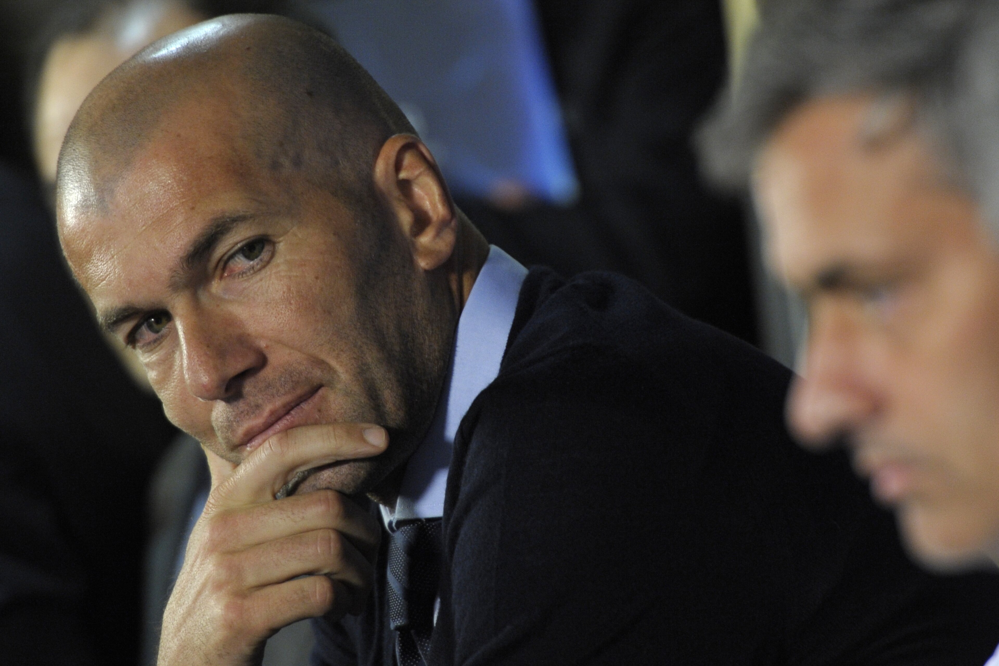 Former French football player Zinedine Zidane (L) looks to Real Madrid's Portuguese coach Jose Mourinho during a press conference at White Hart Lane stadium in London on April 12, 2011, on the eve of the Champions League quarter-final second leg football Former French football player Zinedine Zidane (L) looks to Real Madrid's Portuguese coach Jose Mourinho during a press conference at White Hart Lane stadium in London on April 12, 2011, on the eve of the Champions League quarter-final second leg football