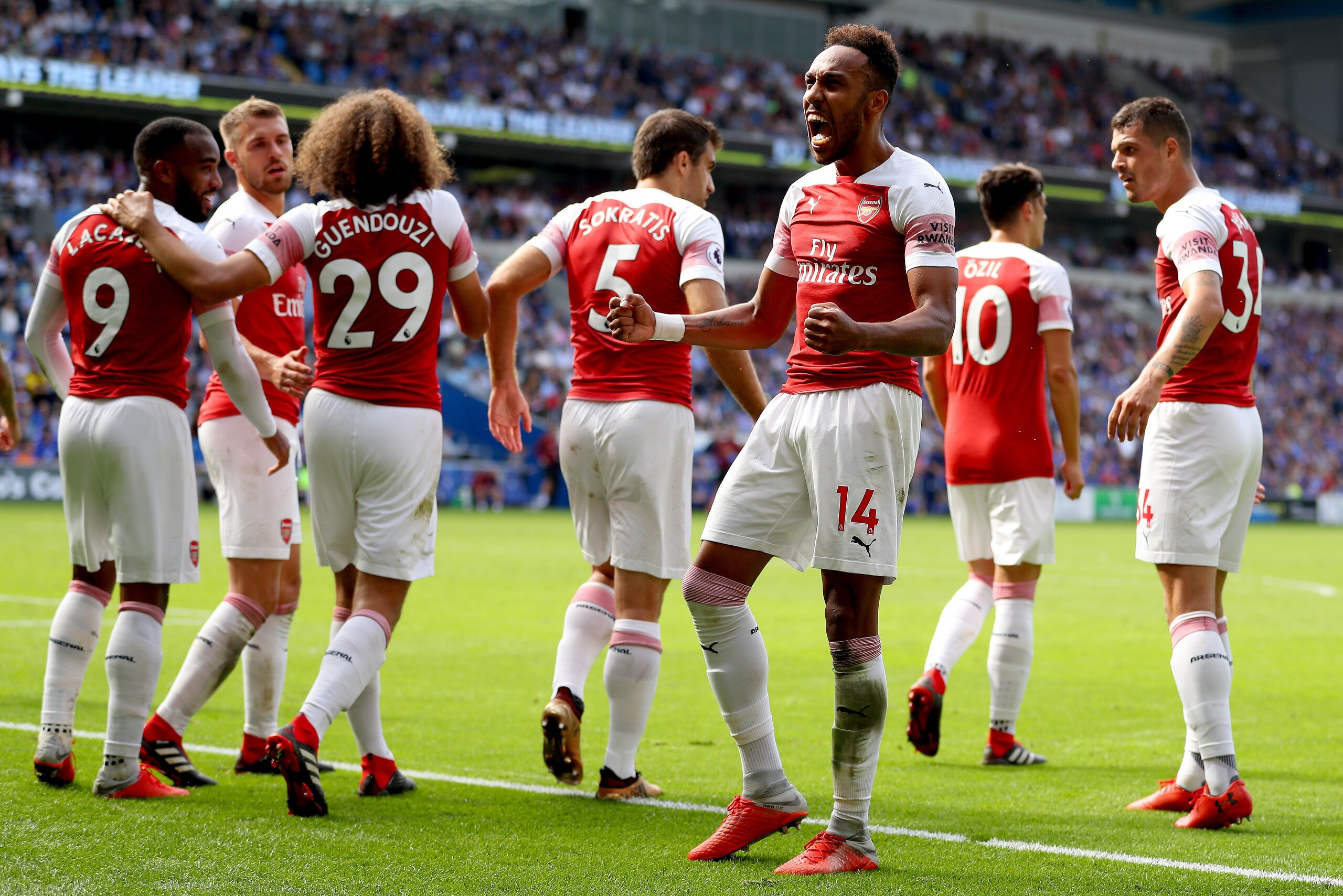 CARDIFF, WALES - SEPTEMBER 02:  Pierre-Emerick Aubameyang of Arsenal celebrates after scoring his team's second goal with team mates during the Premier League match between Cardiff City and Arsenal FC at Cardiff City Stadium on September 2, 2018 in Cardif