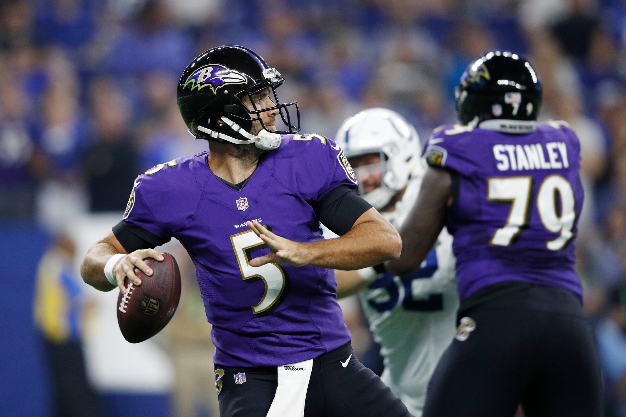 INDIANAPOLIS, IN - AUGUST 20: Joe Flacco #5 of the Baltimore Ravens looks to pass in the first quarter of a preseason game against the Indianapolis Colts at Lucas Oil Stadium on August 20, 2018 in Indianapolis, Indiana. (Photo by Joe Robbins/Getty Images)