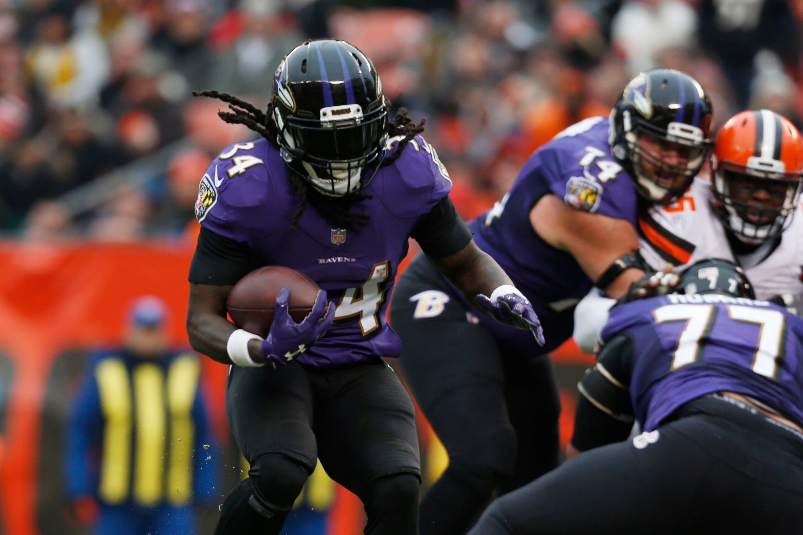 CLEVELAND, OH - DECEMBER 17: Alex Collins #34 of the Baltimore Ravens runs the ball in the first half against the Cleveland Browns at FirstEnergy Stadium on December 17, 2017 in Cleveland, Ohio. (Photo by Kirk Irwin/Getty Images)