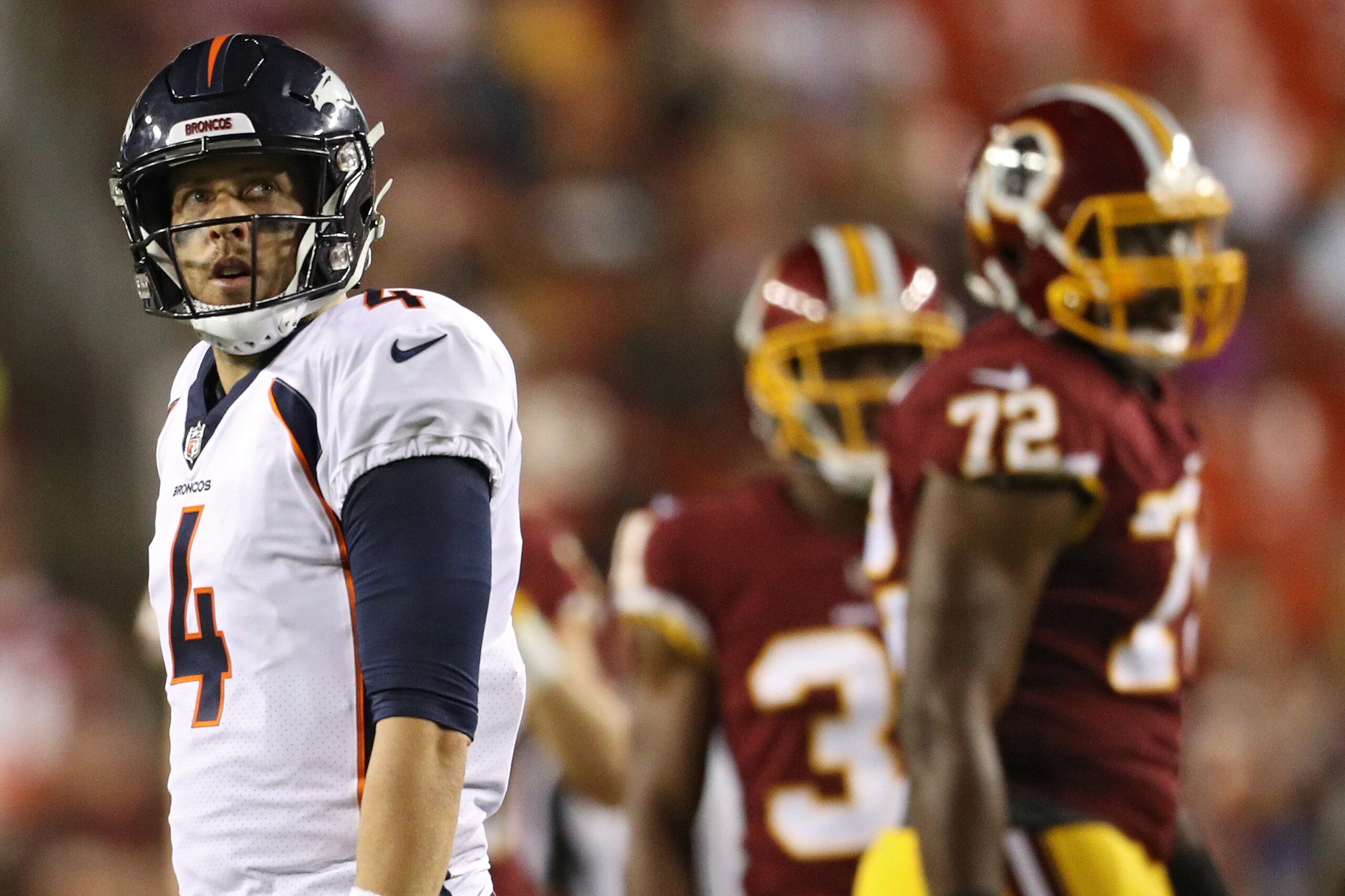 LANDOVER, MD - AUGUST 24: Quarterback Case Keenum #4 of the Denver Broncos looks on against the Washington Redskins in the first half during a preseason game at FedExField on August 24, 2018 in Landover, Maryland. (Photo by Patrick Smith/Getty Images)