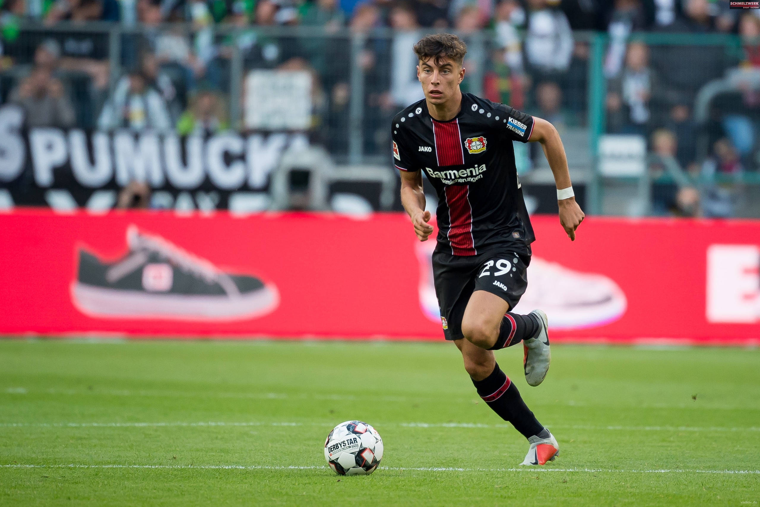 MOENCHENGLADBACH, GERMANY - AUGUST 25: Kai Havertz of Bayer 04 Leverkusen controls the ball during the Bundesliga match between Borussia Moenchengladbach and Bayer 04 Leverkusen at Borussia-Park on August 25, 2018 in Moenchengladbach, Germany. (Photo by T
