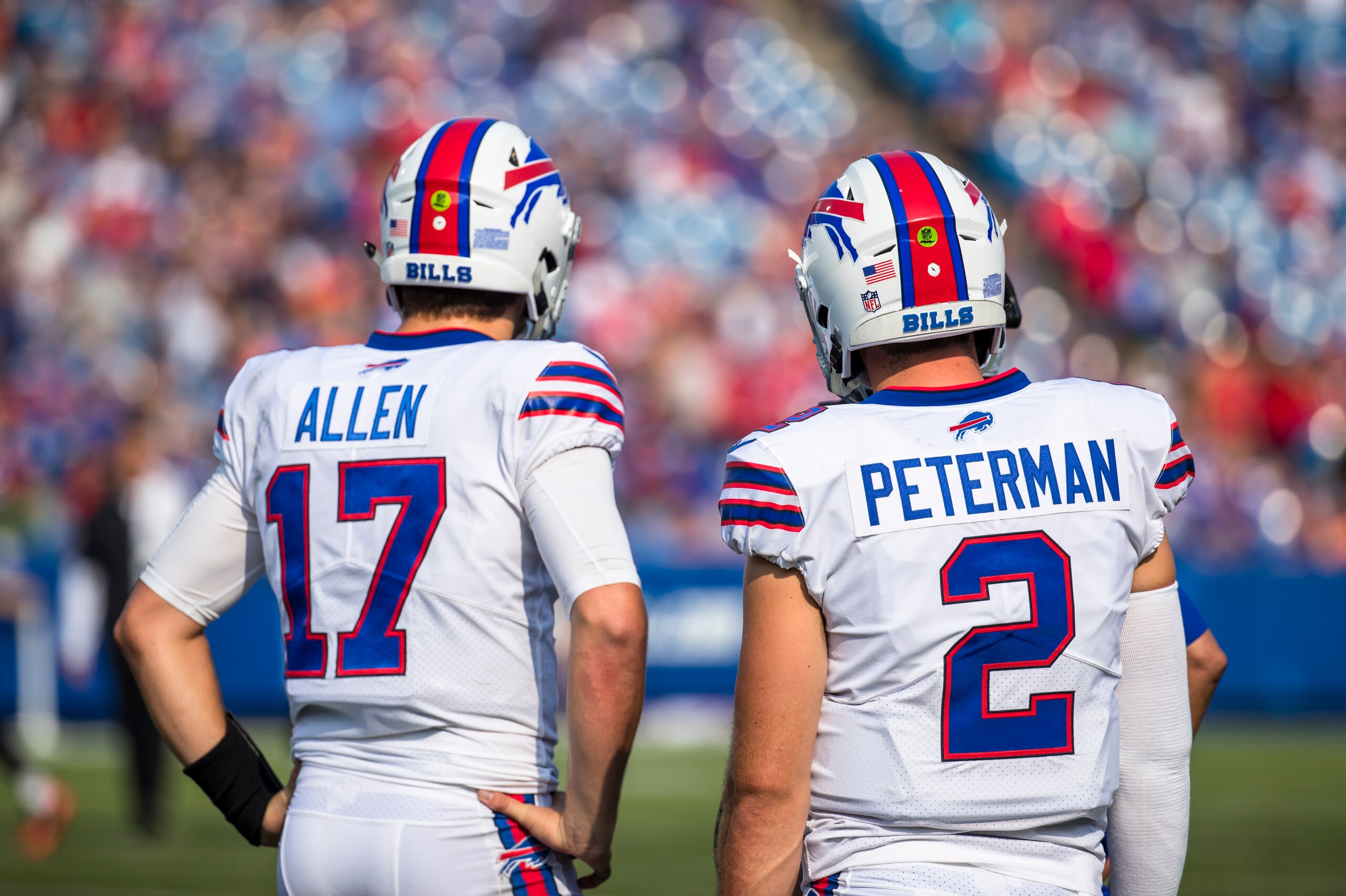 ORCHARD PARK, NY - AUGUST 26: Josh Allen #17 and Nathan Peterman #2 of the Buffalo Bills speak with coaching staff during the preseason game against the Cincinnati Bengals at New Era Field on August 26, 2018 in Orchard Park, New York. Cincinnati defeats ORCHARD PARK, NY - AUGUST 26: Josh Allen #17 and Nathan Peterman #2 of the Buffalo Bills speak with coaching staff during the preseason game against the Cincinnati Bengals at New Era Field on August 26, 2018 in Orchard Park, New York. Cincinnati defeats