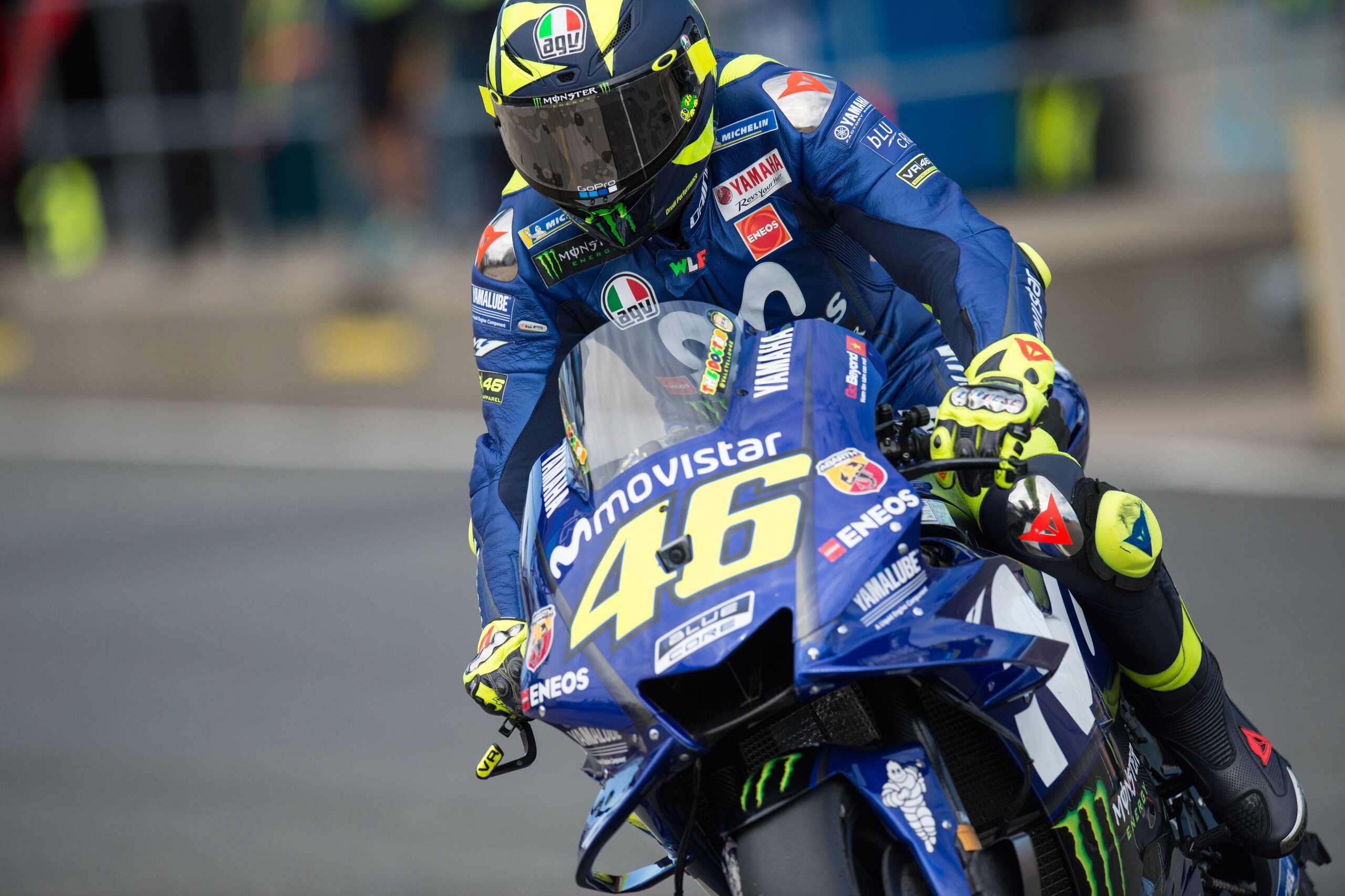 Movistar Yamaha MotoGP's Italian rider Valentino Rossi enters the pits during the MotoGP third free practice session of the motorcycling British Grand Prix at Silverstone circuit in Northamptonshire, southern England, on August 25, 2018. (Photo by OLI SCA