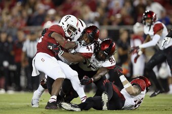 PALO ALTO, CA - AUGUST 31:  Bryce Love #20 of the Stanford Cardinal runs the ball against the San Diego State Aztecs at Stanford Stadium on August 31, 2018 in Palo Alto, California.  (Photo by Ezra Shaw/Getty Images)