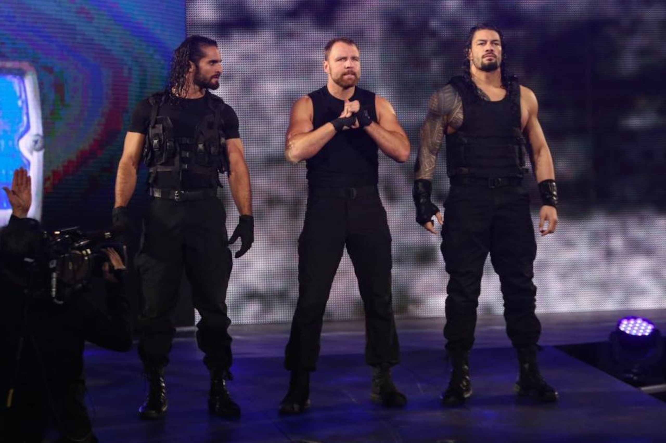 Rollins already looks prophetically suspicious of Ambrose, doesn't he?