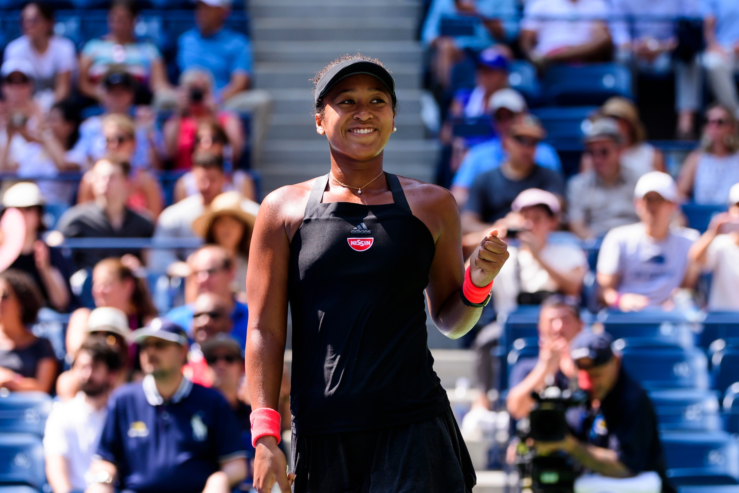 NEW YORK, NY - SEPTEMBER 05: Naomi Osaka of Japan celebrates after beating Lesia Tsurenko of Ukraine in the quarter finals of the US Open at the USTA Billie Jean King National Tennis Centre on September 05, 2018 in New York City, United States. (Photo by 