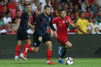FARO, PORTUGAL - September 6:  Mateo Kovacic of Croatia and Chelsea with Bernardo Silva of Portugal and Manchester City in action during the International Friendly match between Portugal and Croatia at Estadio Algarve on September 6, 2018 in Faro, Portuga