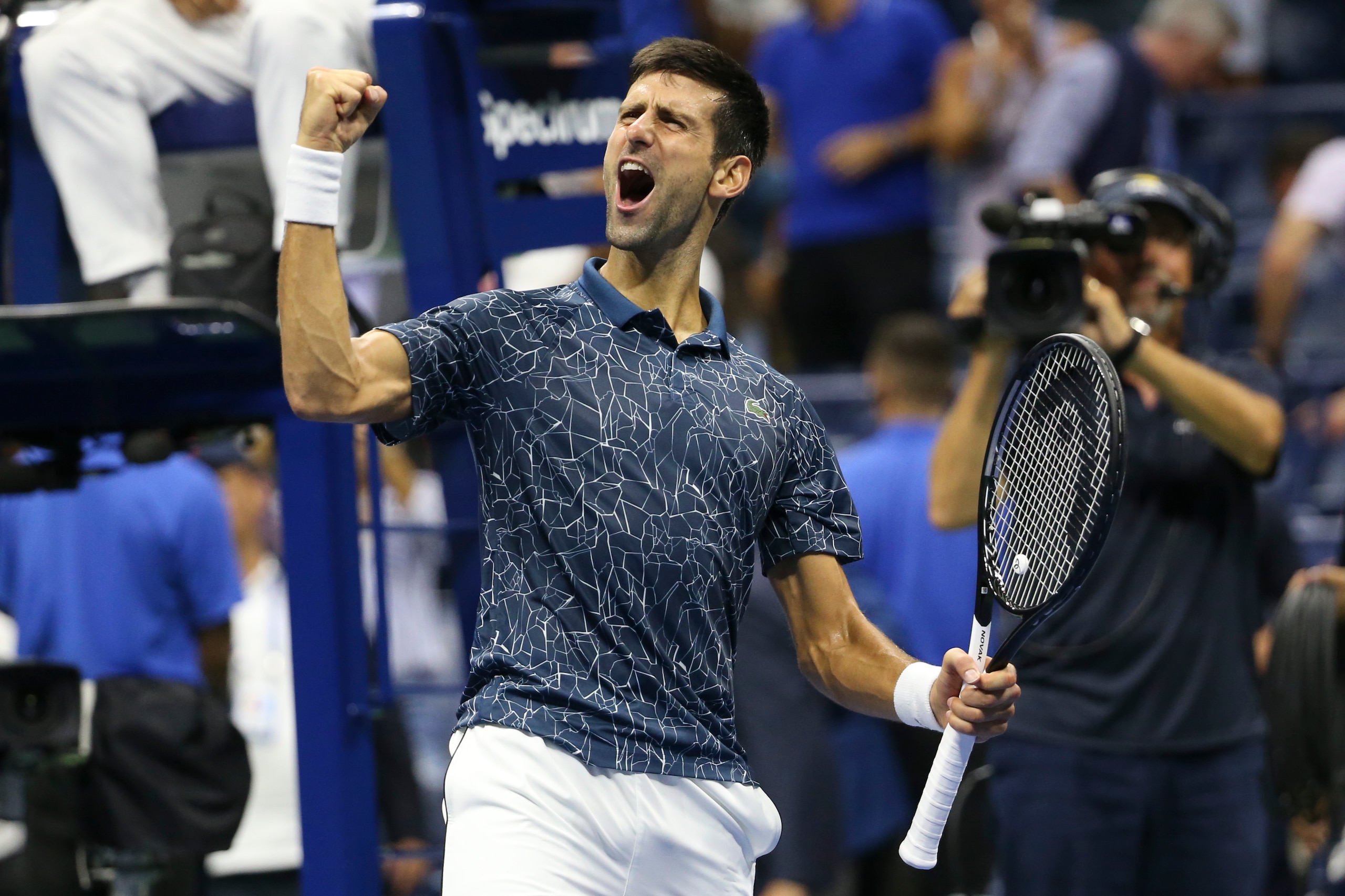 NEW YORK, NY - SEPTEMBER 7: Novak Djokovic of Serbia celebrates winning his semifinal against Kei Nishikori of Japan on day 12 of the 2018 US Open at Arthur Ashe Stadium of USTA Billie Jean King National Tennis Center on September 7, 2018 in Flushing Mead NEW YORK, NY - SEPTEMBER 7: Novak Djokovic of Serbia celebrates winning his semifinal against Kei Nishikori of Japan on day 12 of the 2018 US Open at Arthur Ashe Stadium of USTA Billie Jean King National Tennis Center on September 7, 2018 in Flushing Mead