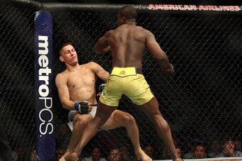 DALLAS, TX - SEPTEMBER 08:  (L-R)  Niko Price and Abdul Razak Alhassan in their Welterweight bout during UFC 228 at American Airlines Center on September 8, 2018 in Dallas, United States.  (Photo by Ronald Martinez/Getty Images)
