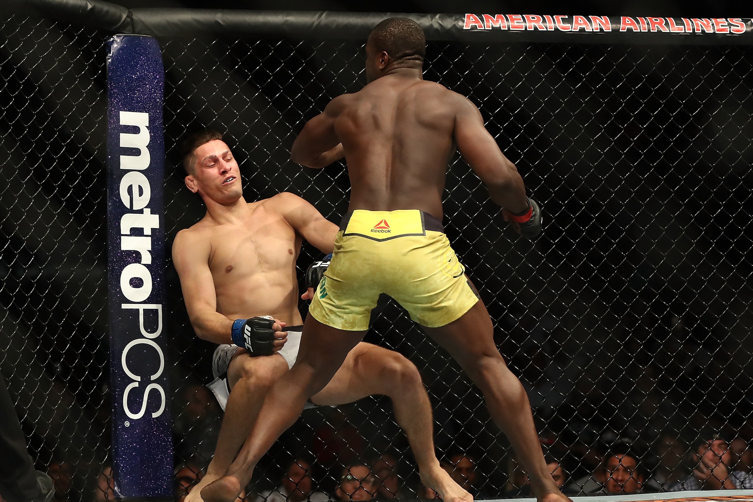 DALLAS, TX - SEPTEMBER 08:  (L-R)  Niko Price and Abdul Razak Alhassan in their Welterweight bout during UFC 228 at American Airlines Center on September 8, 2018 in Dallas, United States.  (Photo by Ronald Martinez/Getty Images)