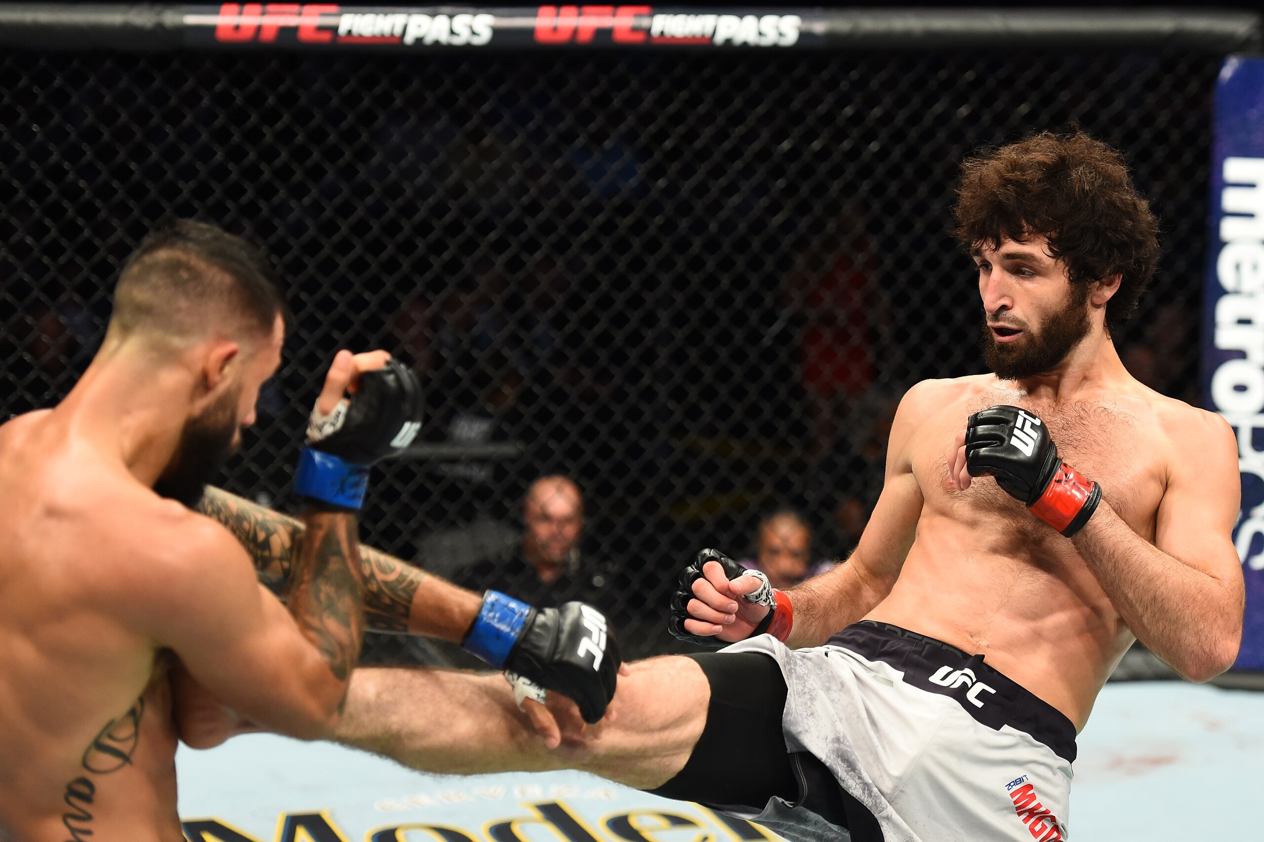 DALLAS, TX - SEPTEMBER 08:  (R-L) Zabit Magomedsharipov of Russia kicks Brandon Davis in their featherweight fight during the UFC 228 event at American Airlines Center on September 8, 2018 in Dallas, Texas. (Photo by Josh Hedges/Zuffa LLC/Zuffa LLC via Ge
