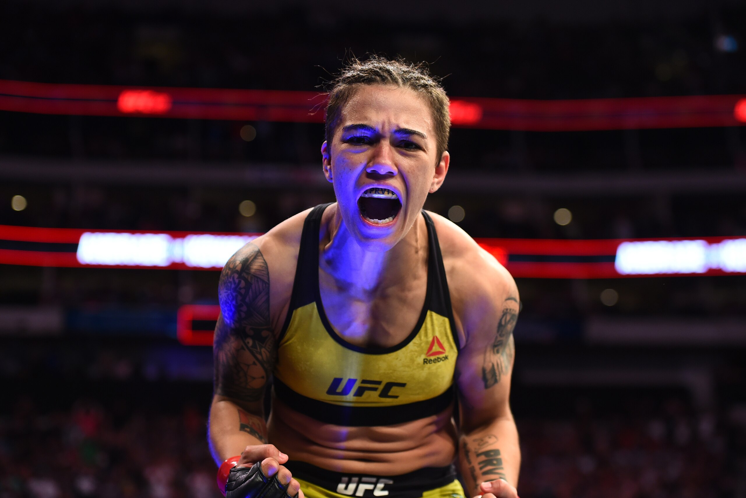 DALLAS, TX - SEPTEMBER 08:  Jessica Andrade of Brazil celebrates after knocking out Karolina Kowalkiewicz of Poland in their women's strawweight fight during the UFC 228 event at American Airlines Center on September 8, 2018 in Dallas, Texas. (Photo by Jo